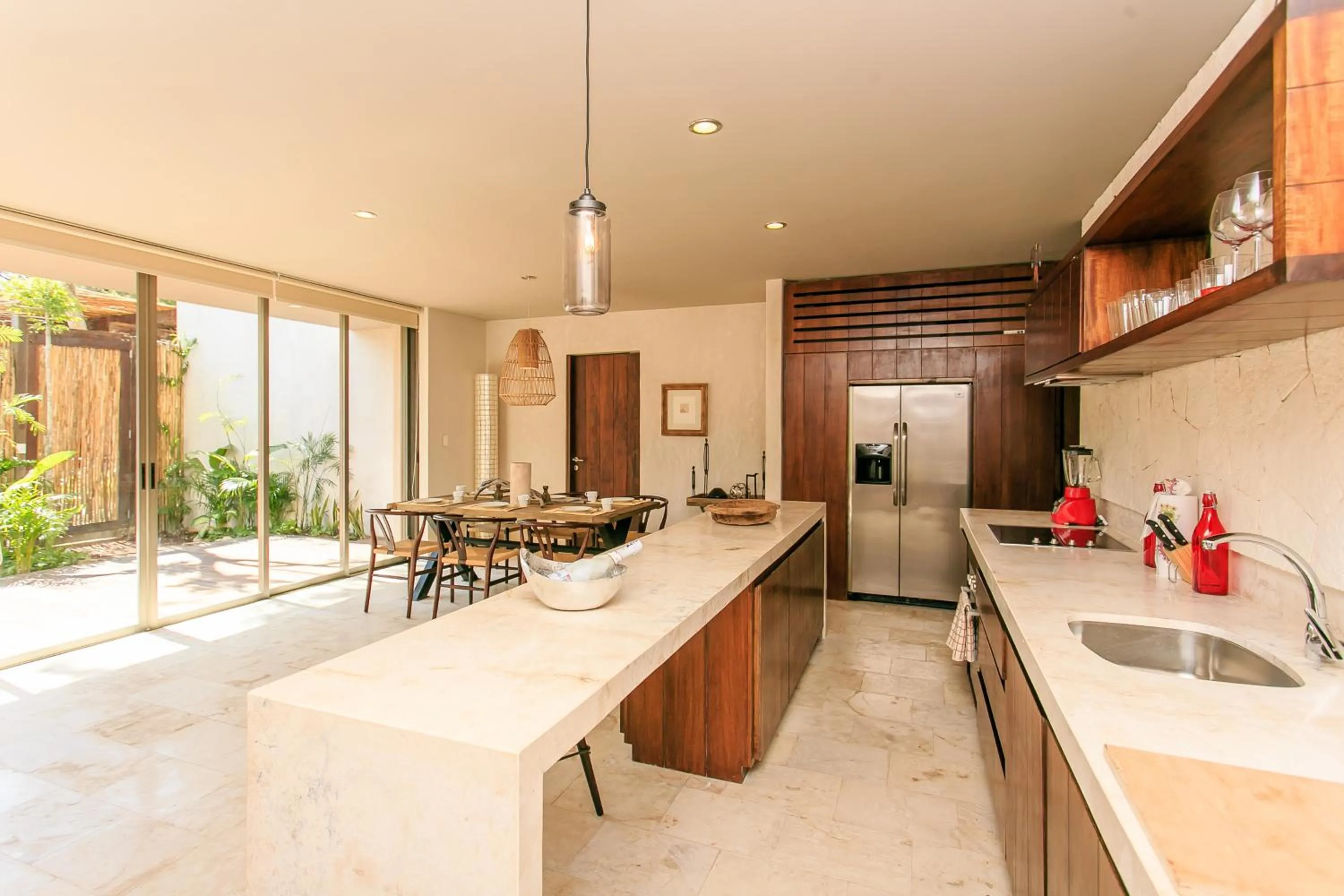 Kitchen or kitchenette in Eco-chic Design Condos Wrapped in Nature's Elements by Stella Rentals