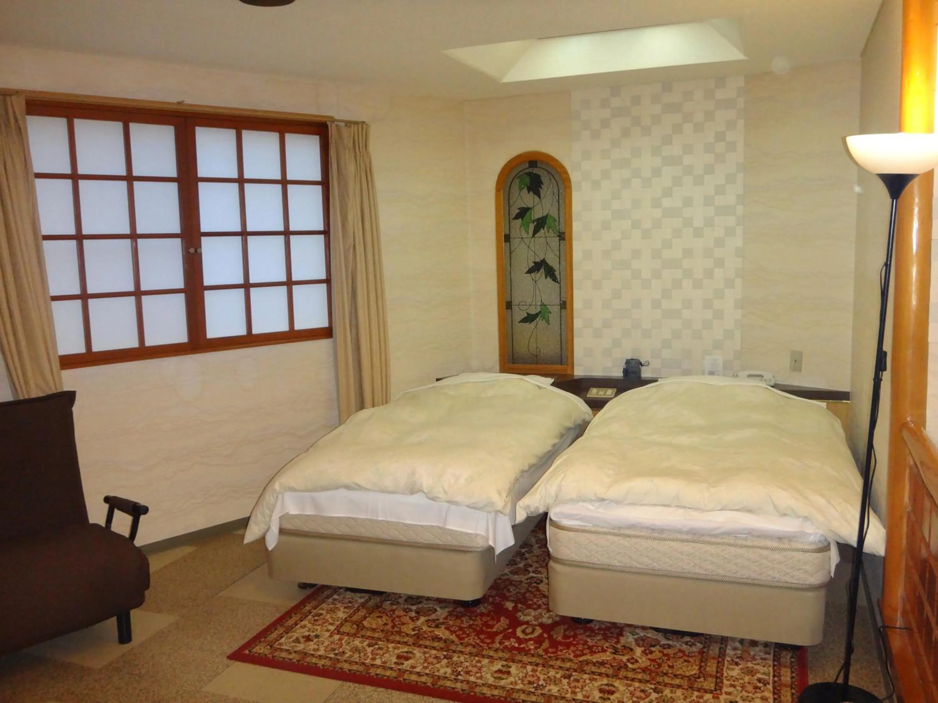 Photo of the whole room, Bed in Utility Hotel Coo