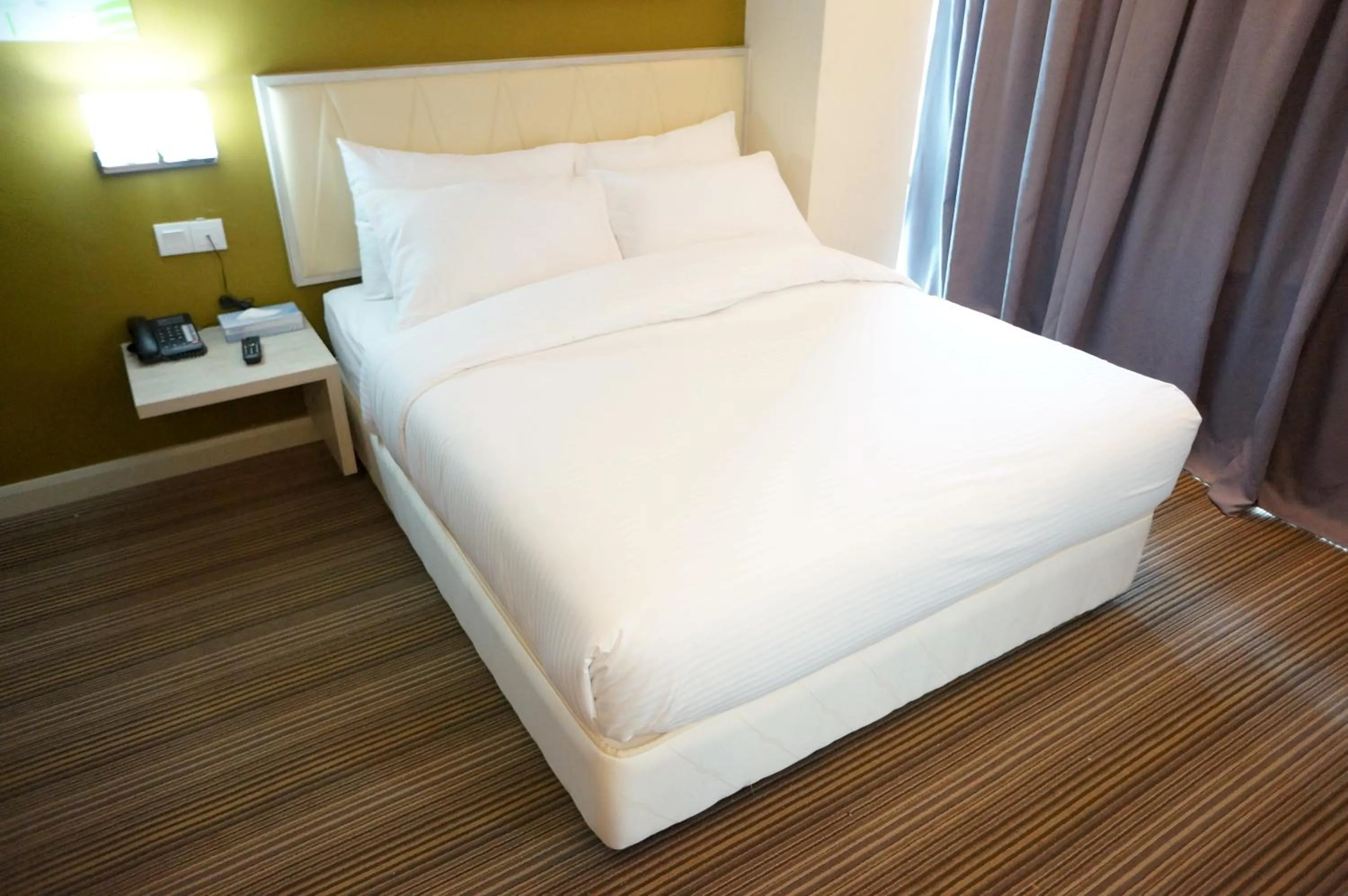 Bed in Kosma Business Hotel