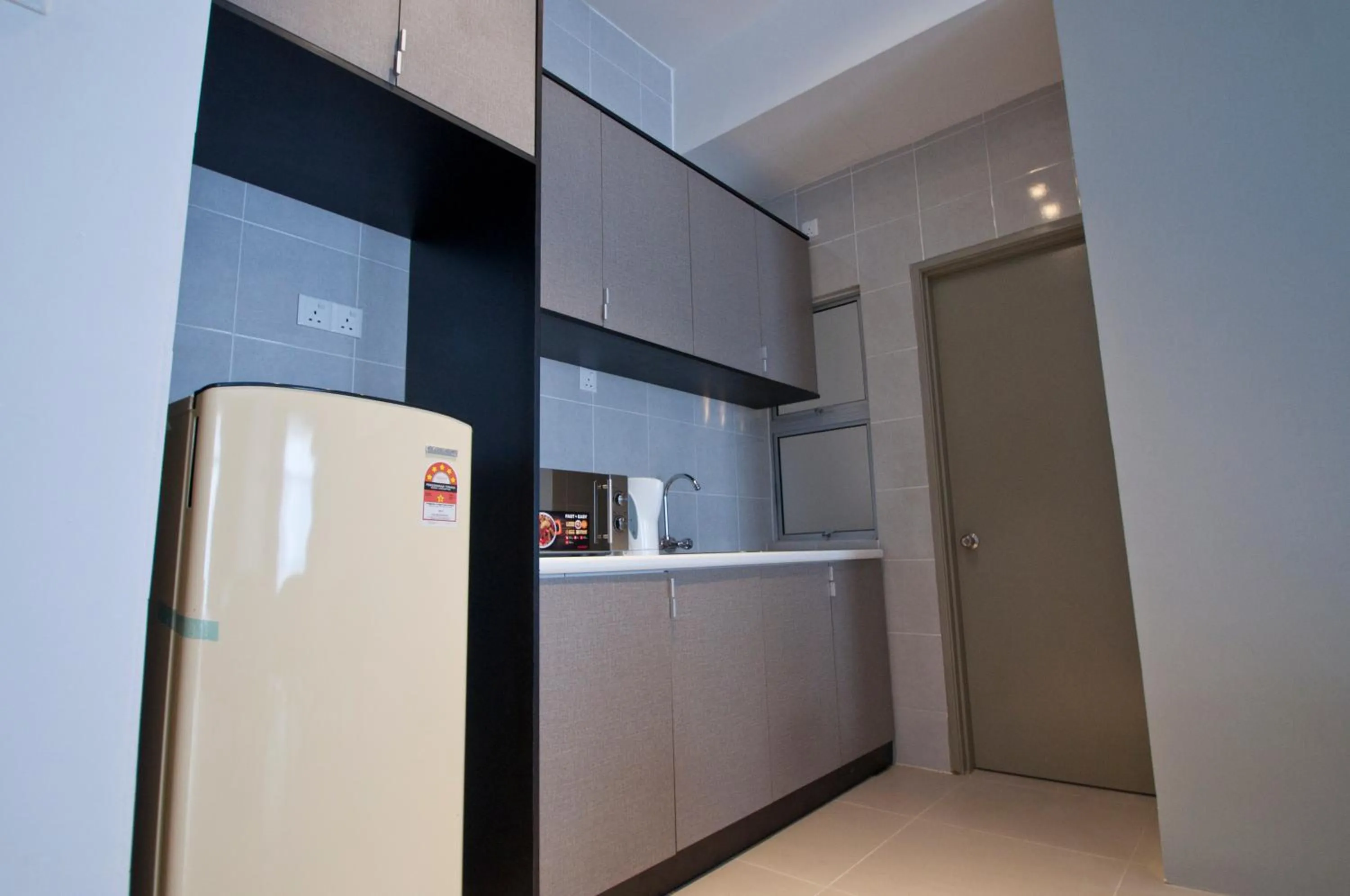 Kitchen or kitchenette in DreamScape Apartment @ Golden Hill