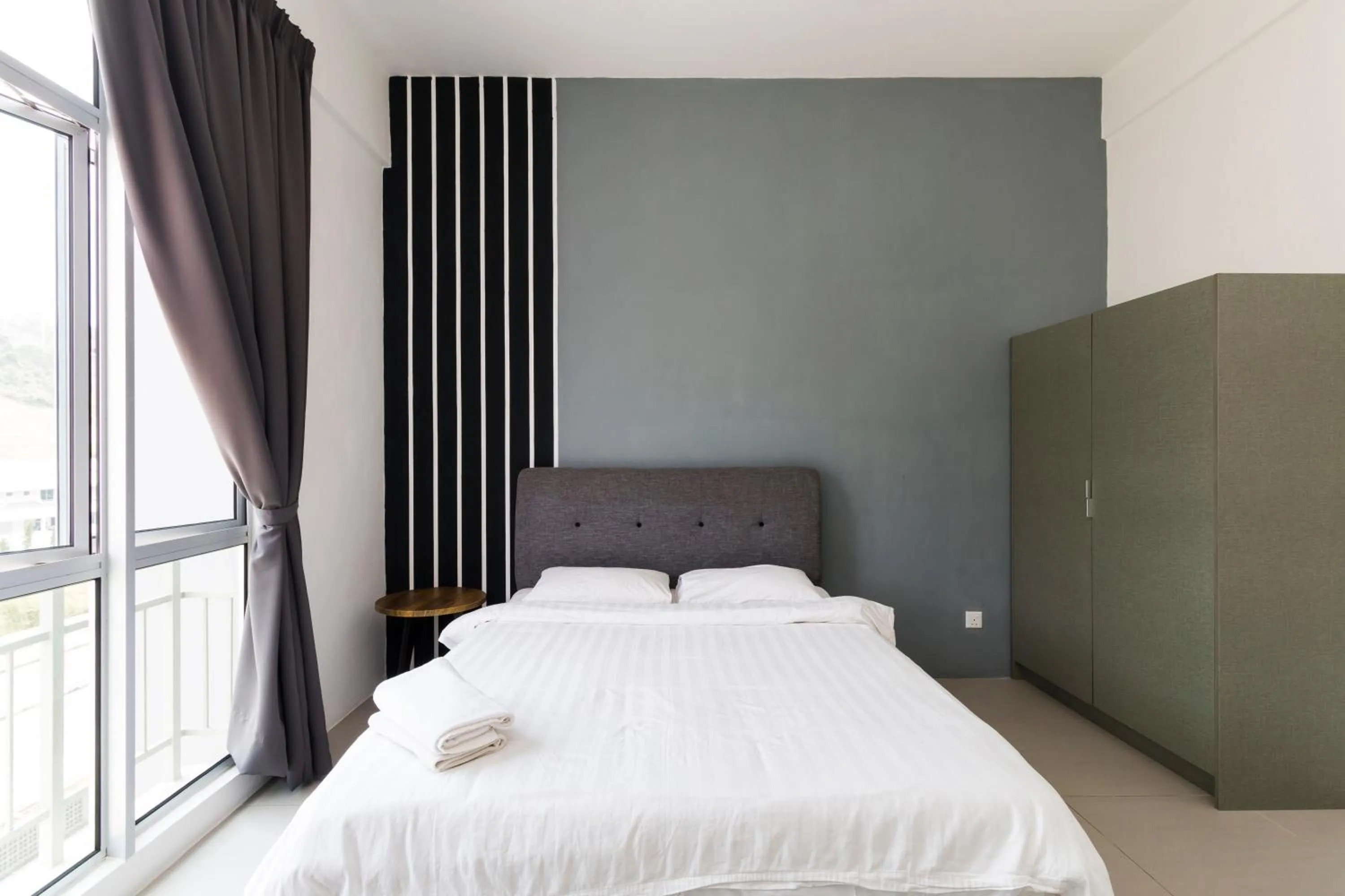 Bed in DreamScape Apartment @ Golden Hill