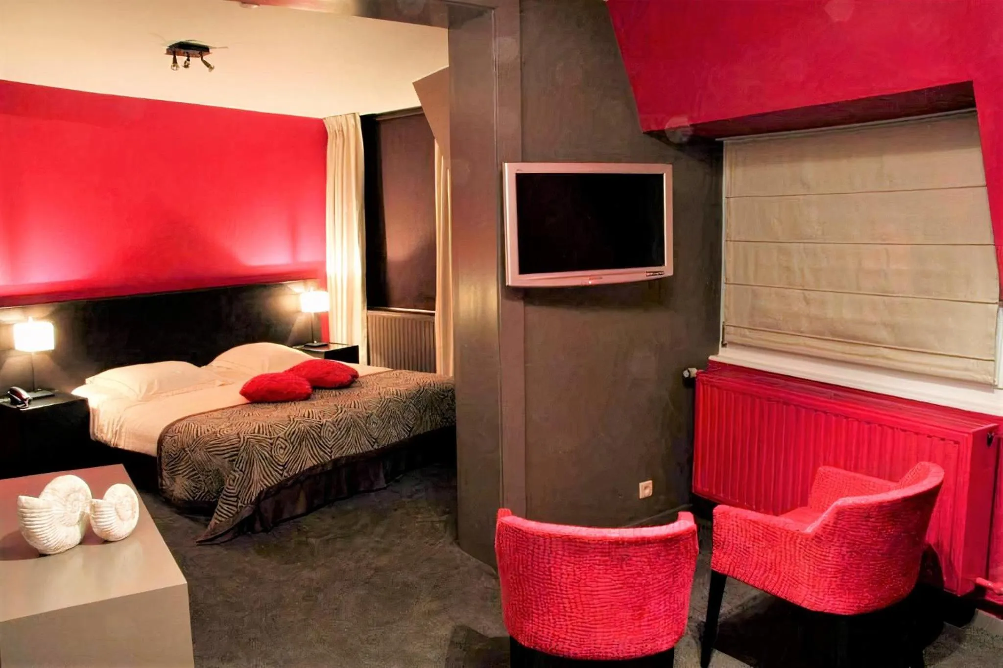 Bed in Hotel L'Esprit Sain