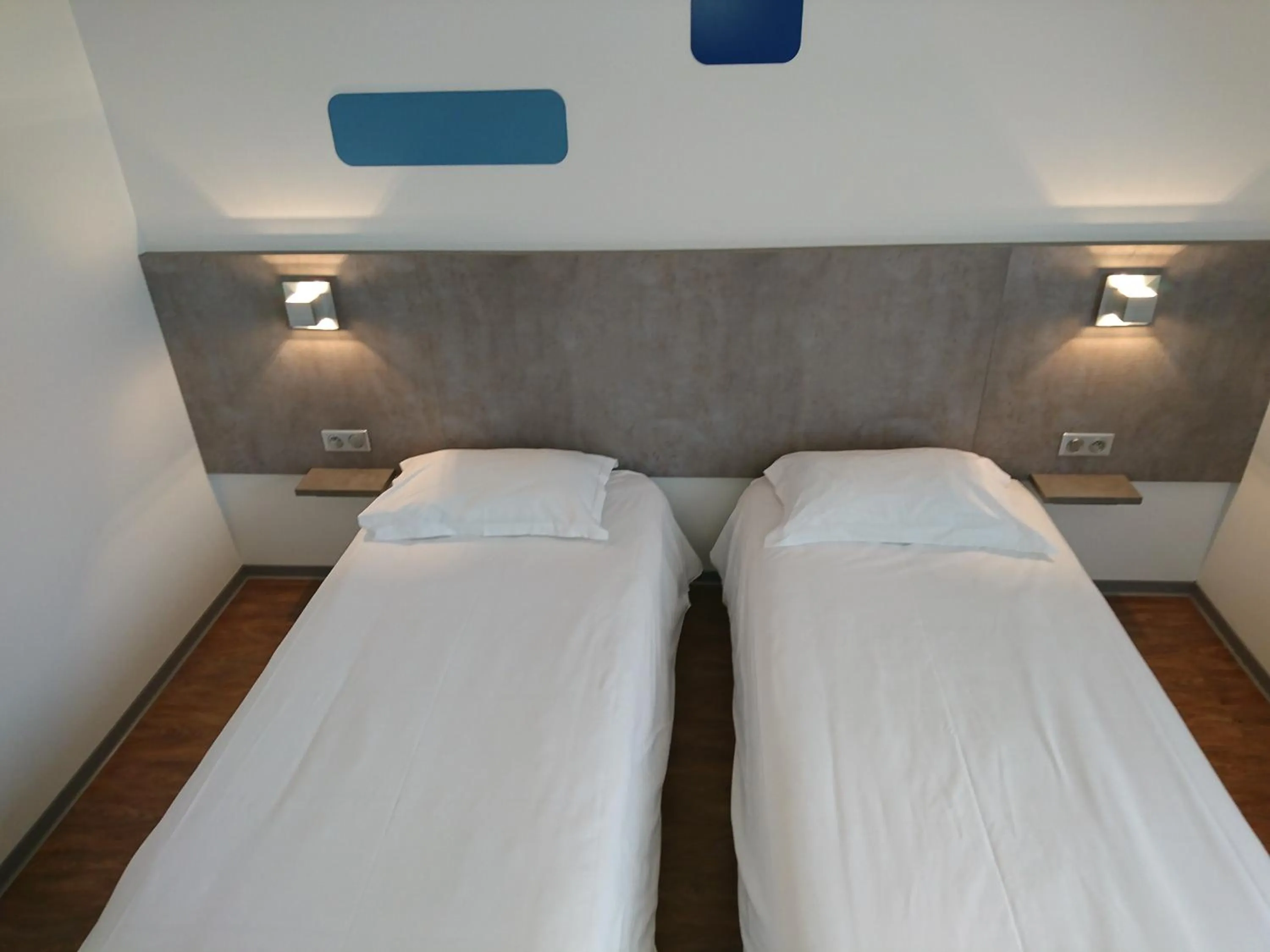 Bed in H24 HOTEL