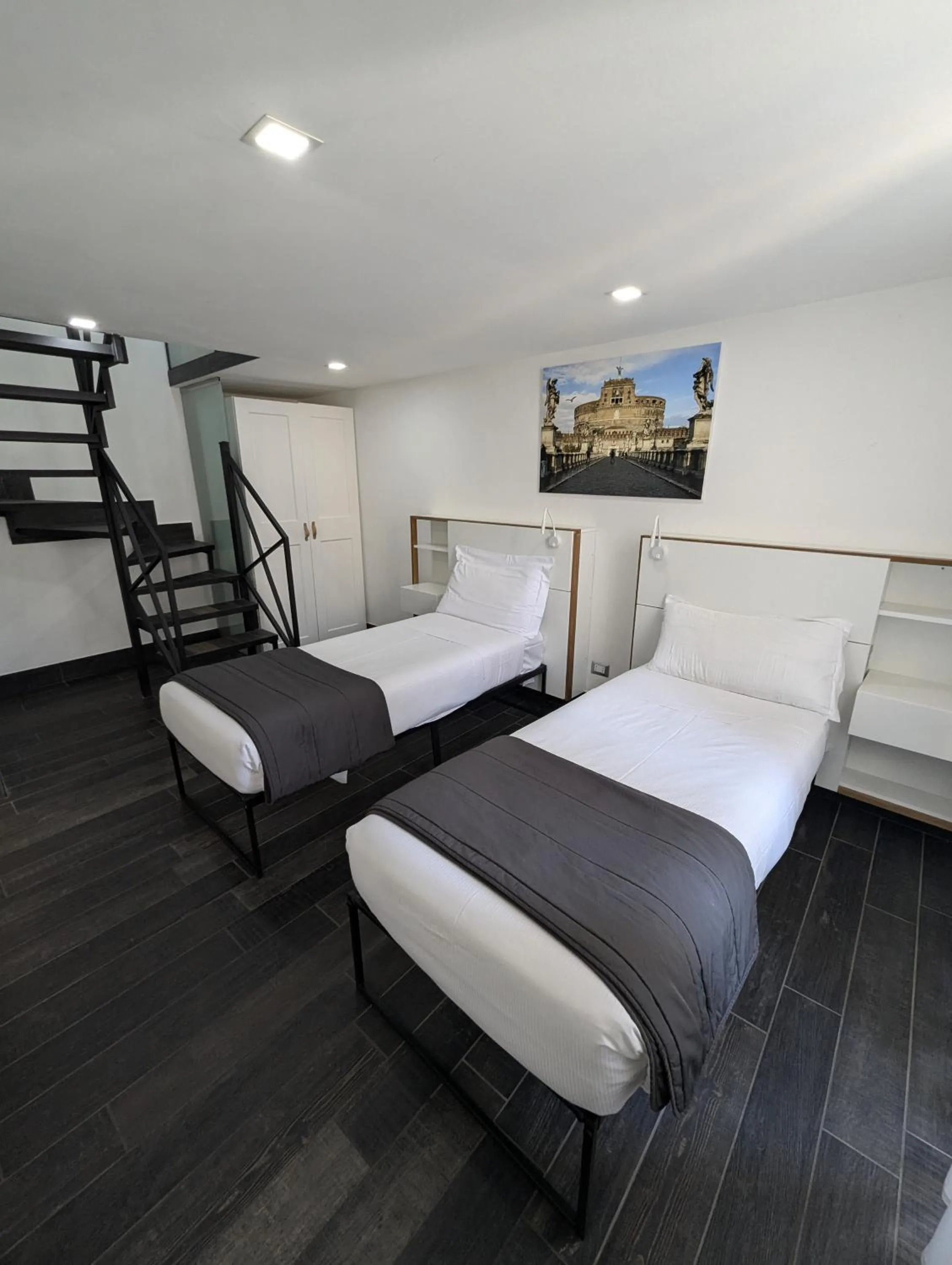 Photo of the whole room, Bed in Arch Rome Suites