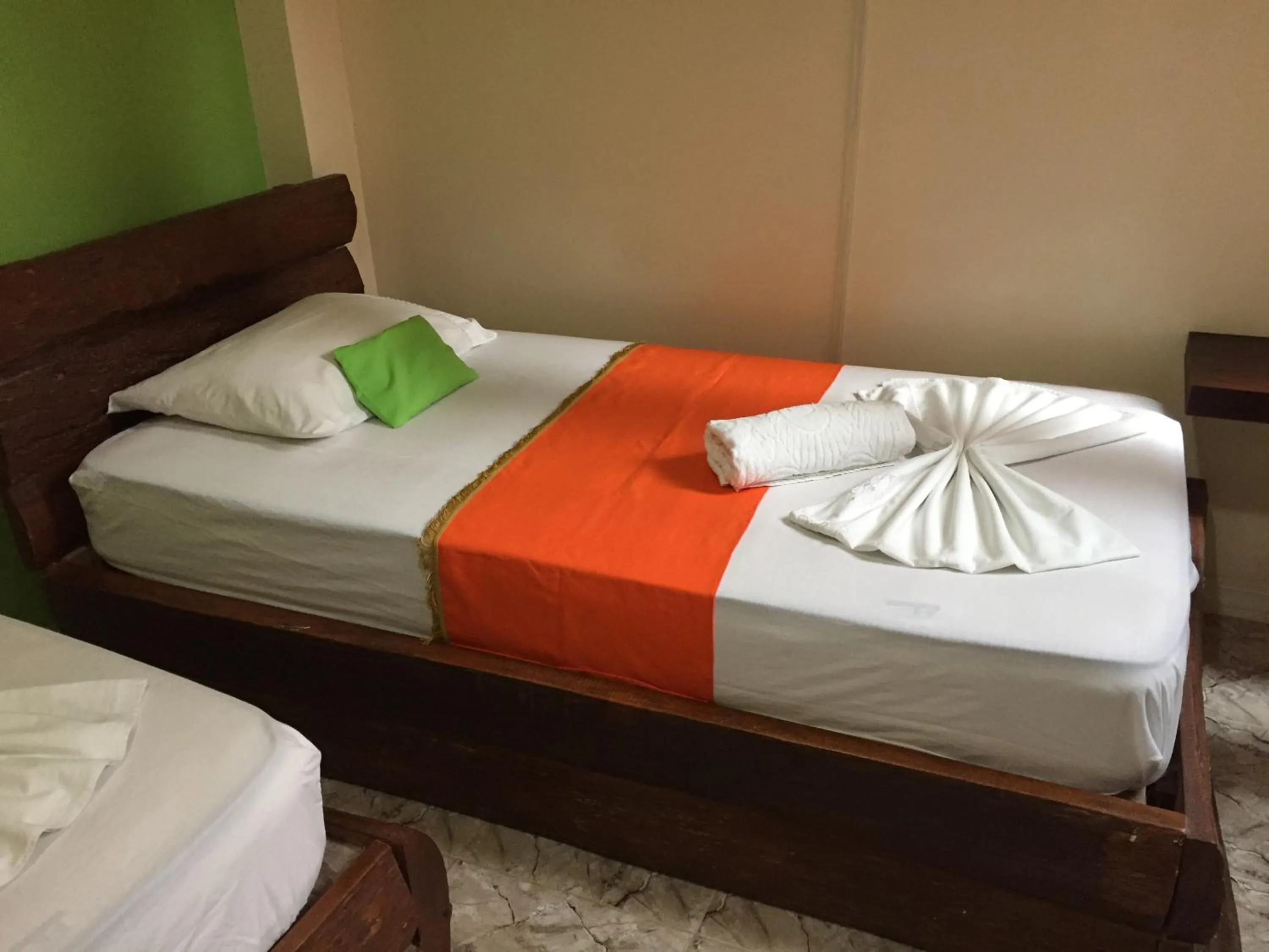 Bed in ApartaHotel Tierras Amazonicas
