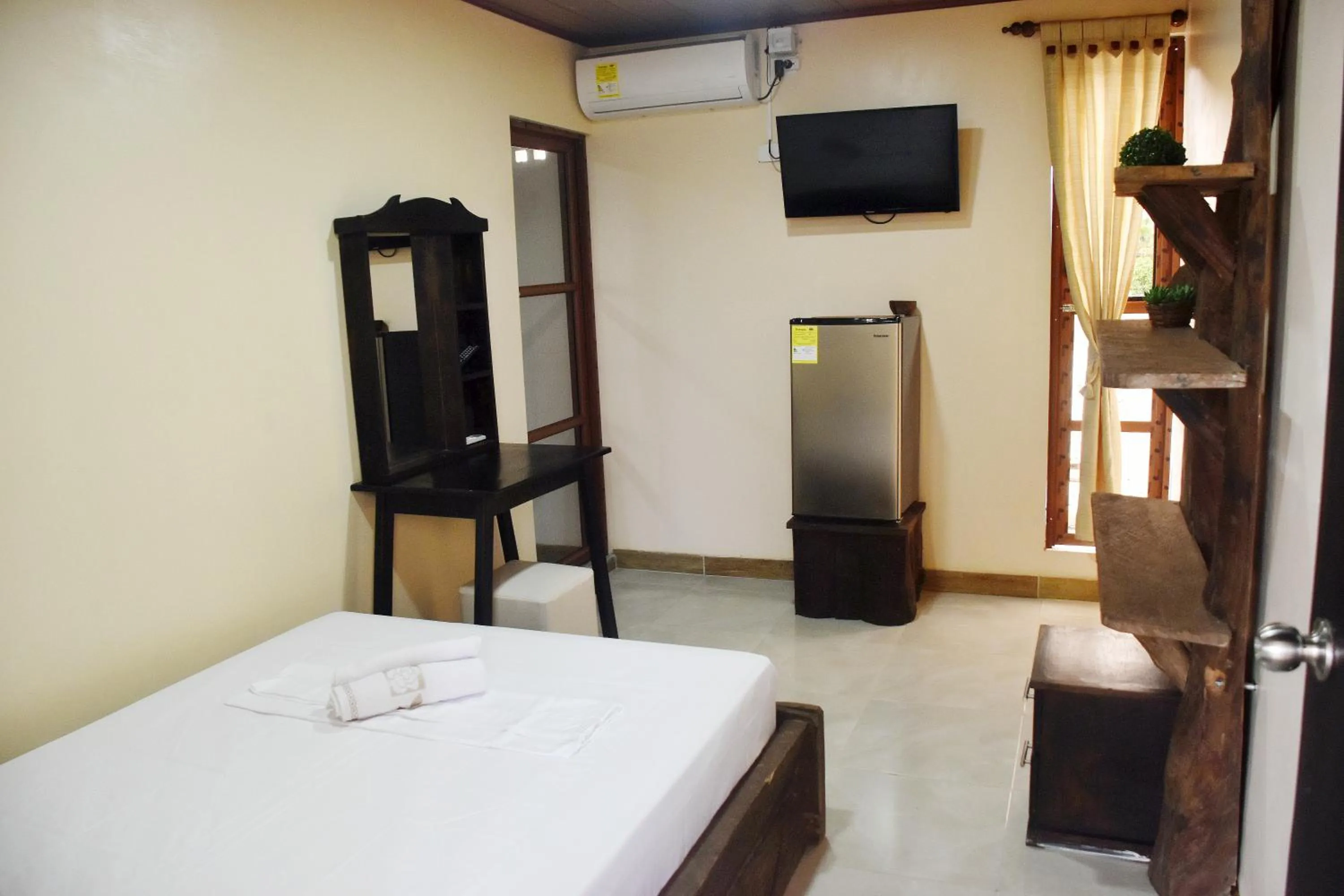 Bed in ApartaHotel Tierras Amazonicas