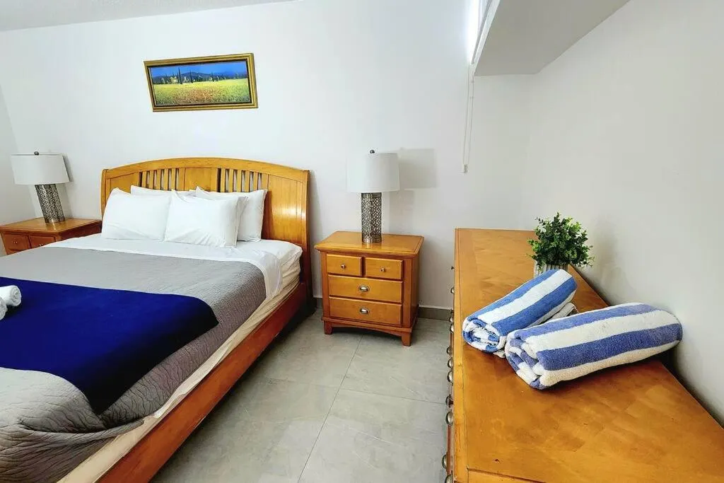 Photo of the whole room, Bed in OCEAN VIEW DELUXE SUITE: PVT. BEACH & POOL