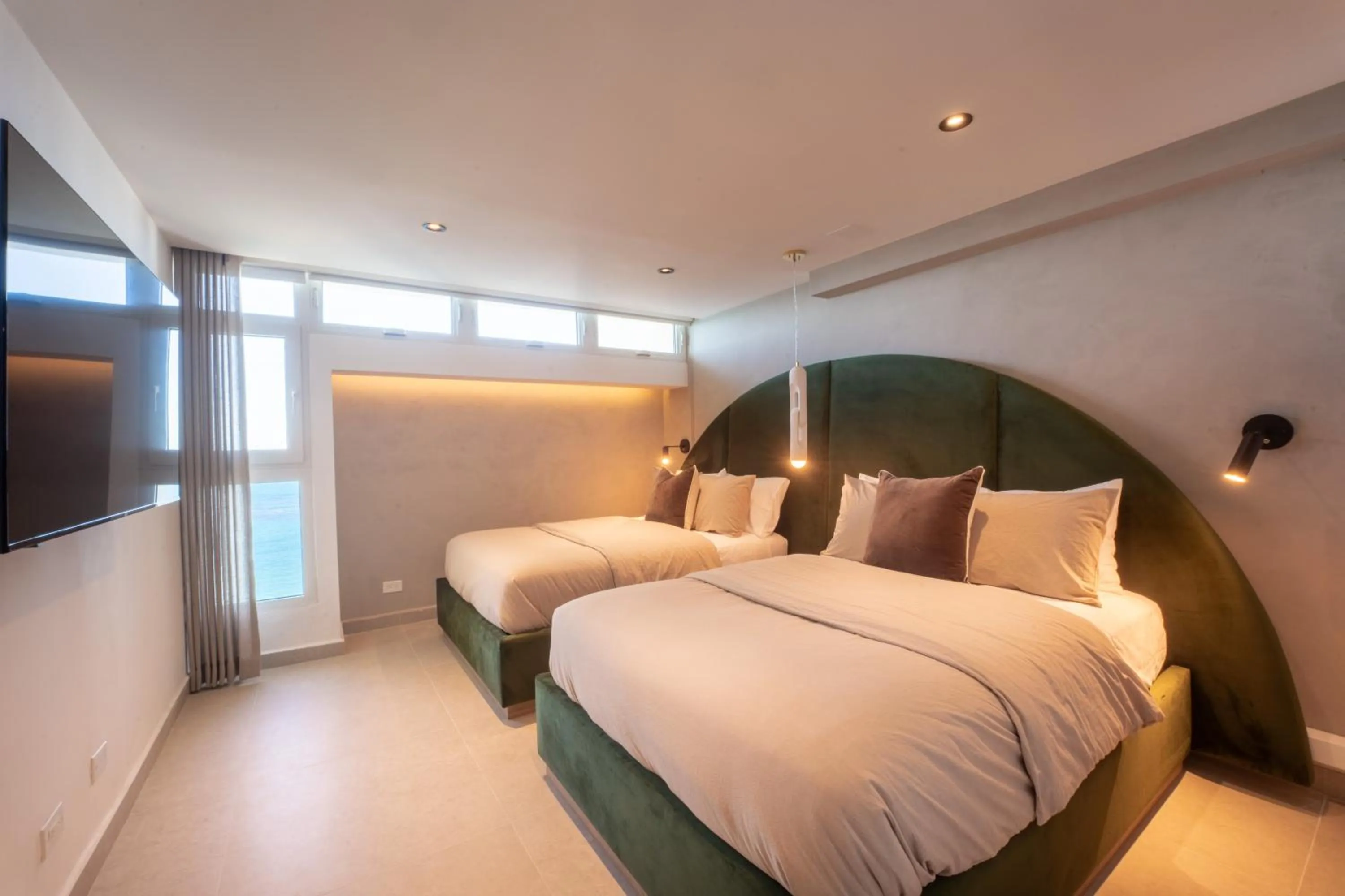 Bedroom, Bed in OCEAN VIEW DELUXE SUITE: PVT. BEACH & POOL