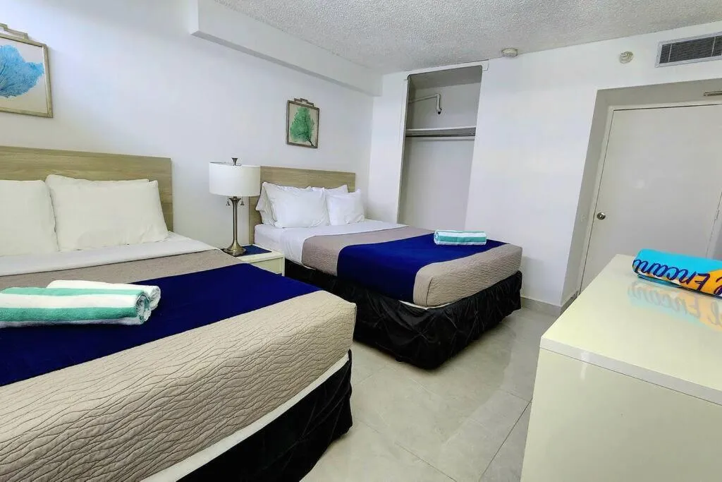 Photo of the whole room, Bed in OCEAN VIEW DELUXE SUITE: PVT. BEACH & POOL