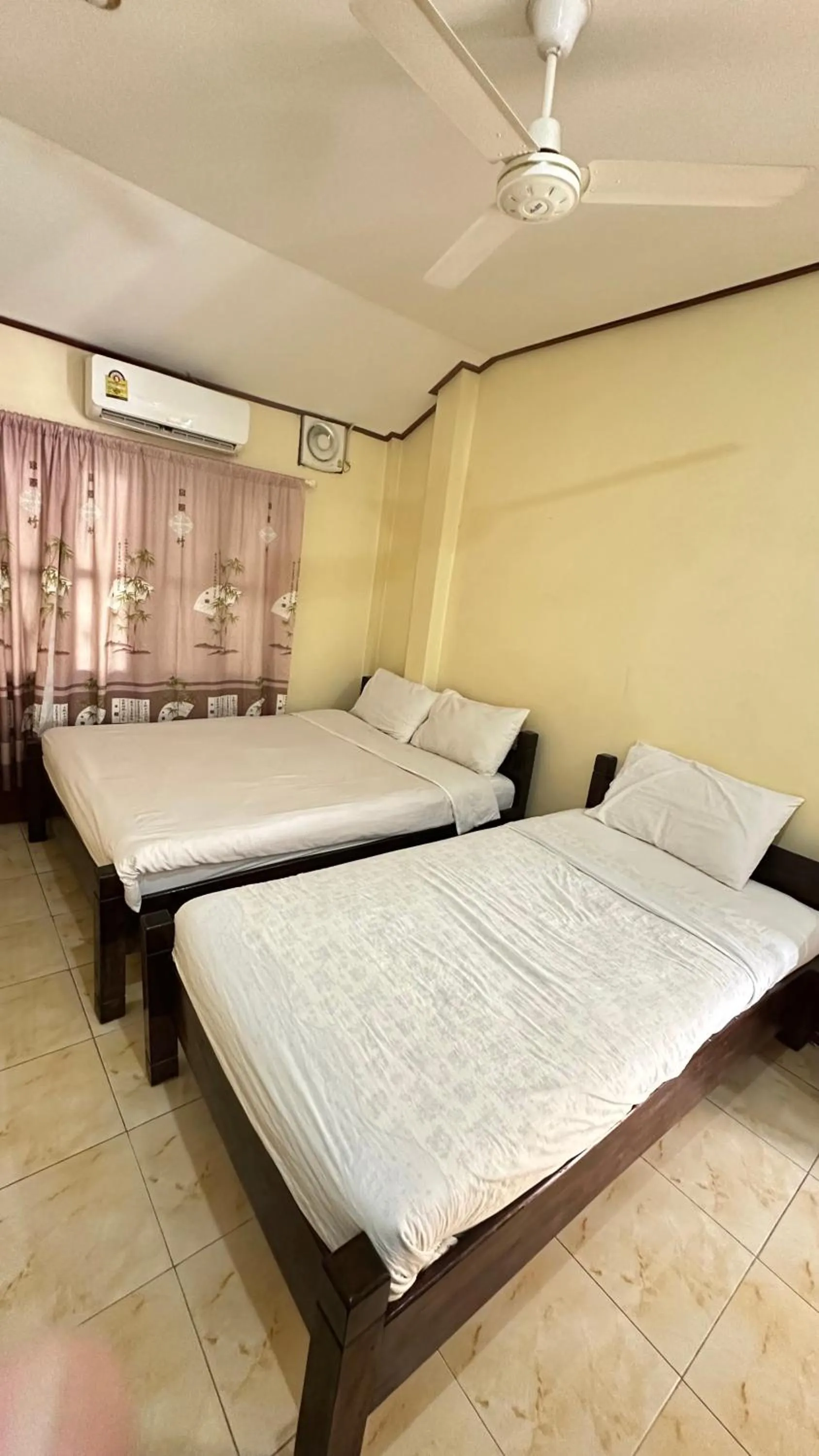 Bed in Pakbeng Guesthouse