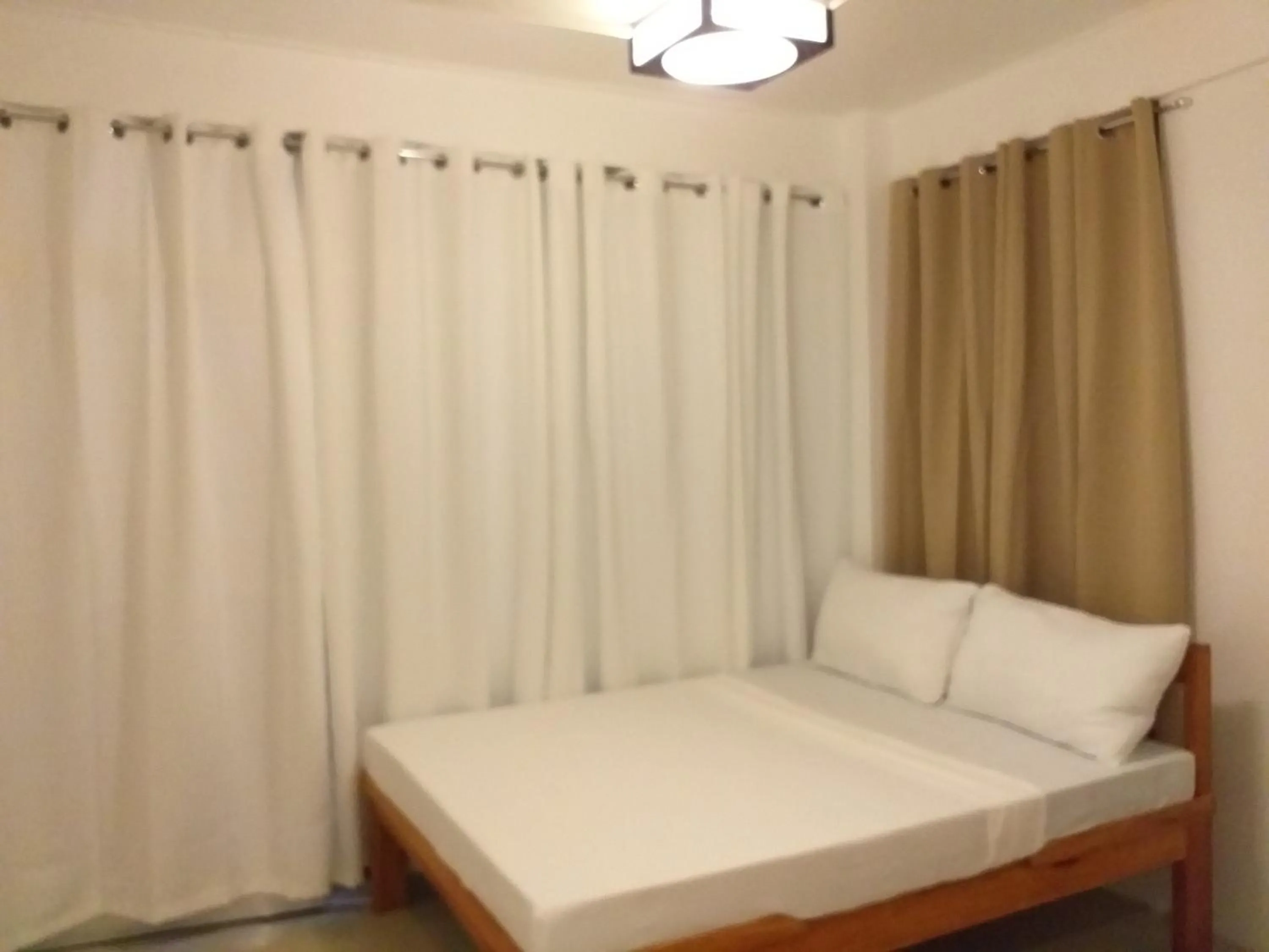 Bedroom in Zenith Inn & Resto Bar