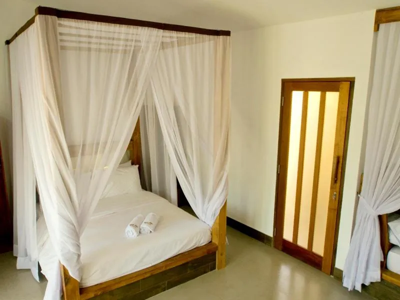 Bed in Gili Air Bungalows