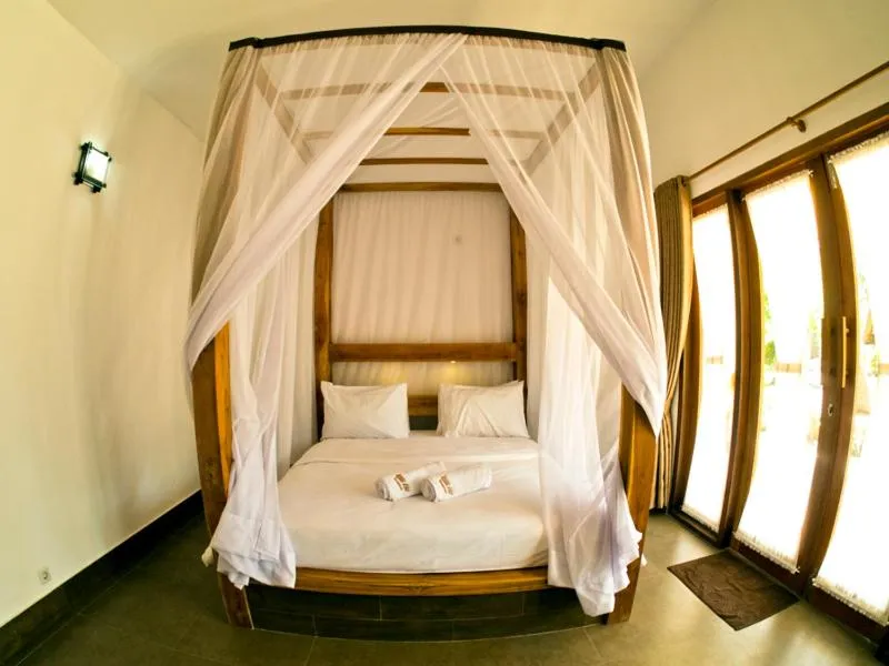 Bed in Gili Air Bungalows