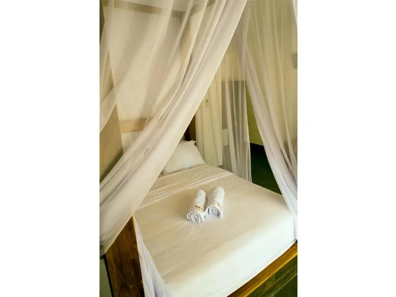Bed in Gili Air Bungalows