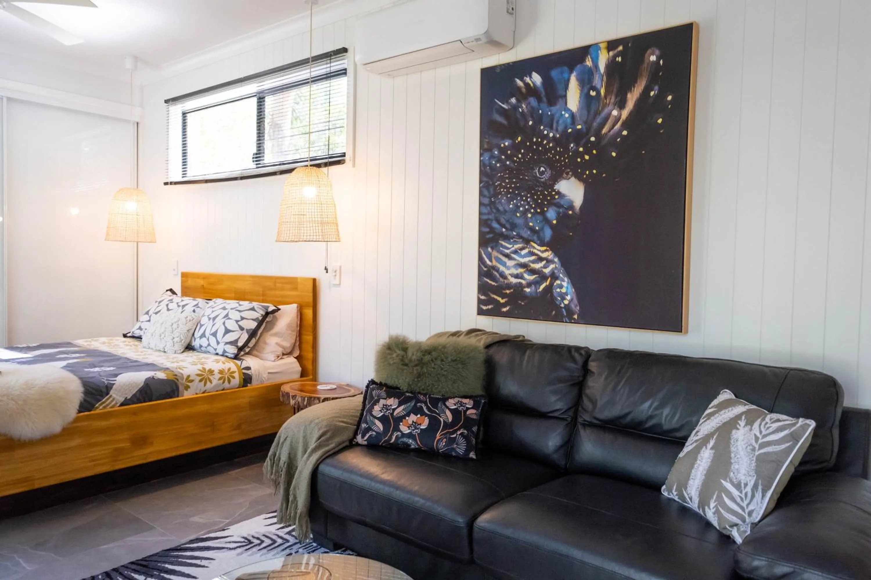 Lounge or bar, Bed in Airlie Beach Eco Cabins - Adults Only
