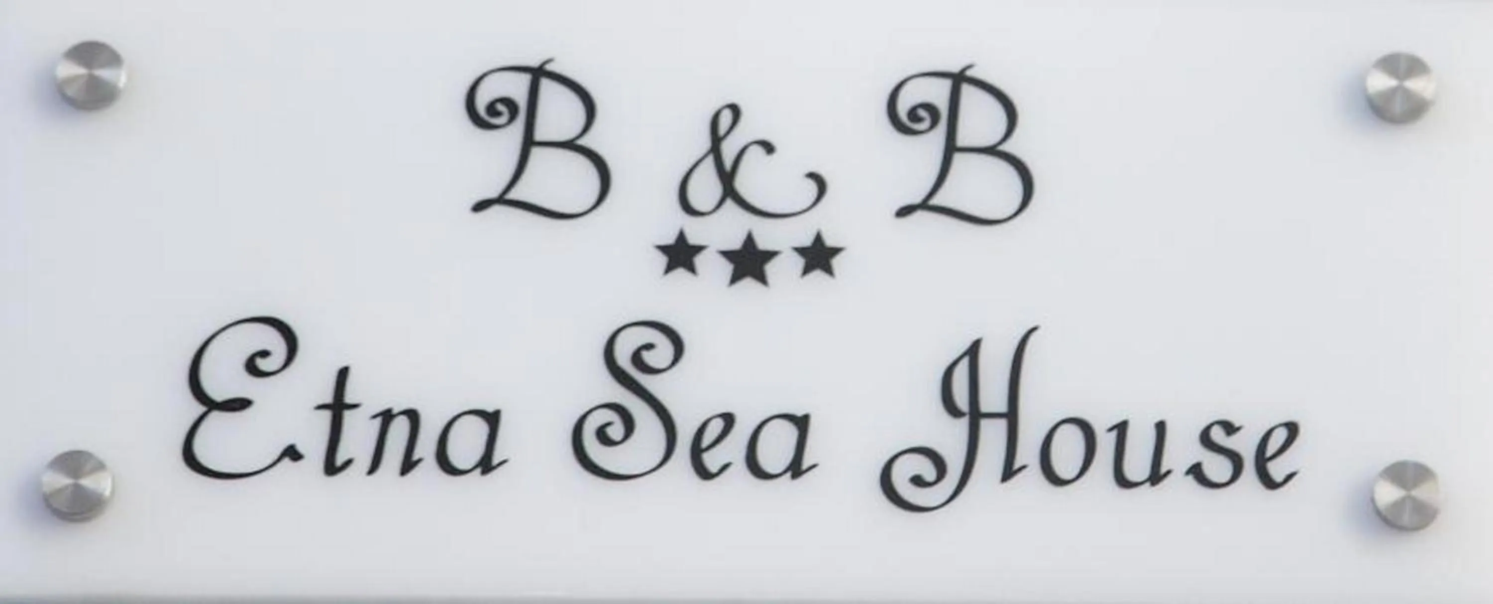 Property logo or sign in Etna Sea House