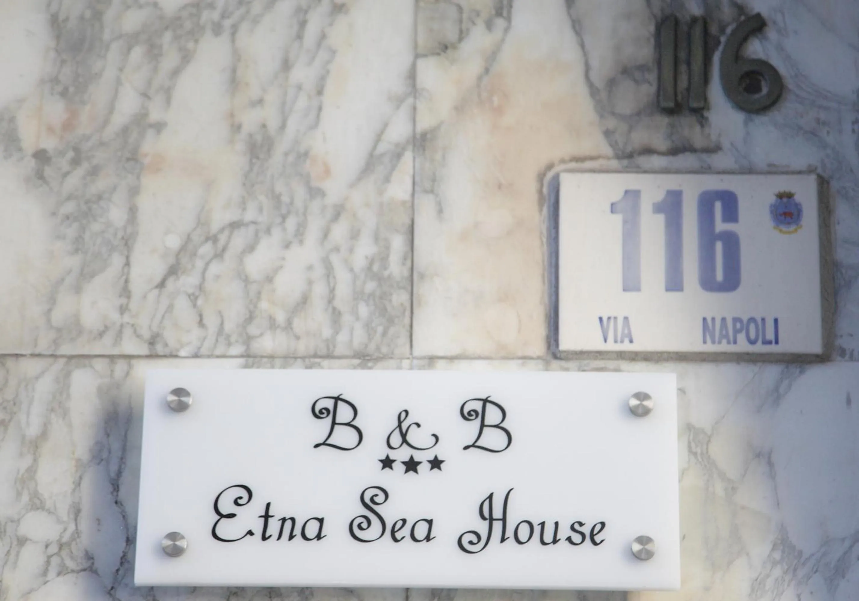 Property logo or sign in Etna Sea House