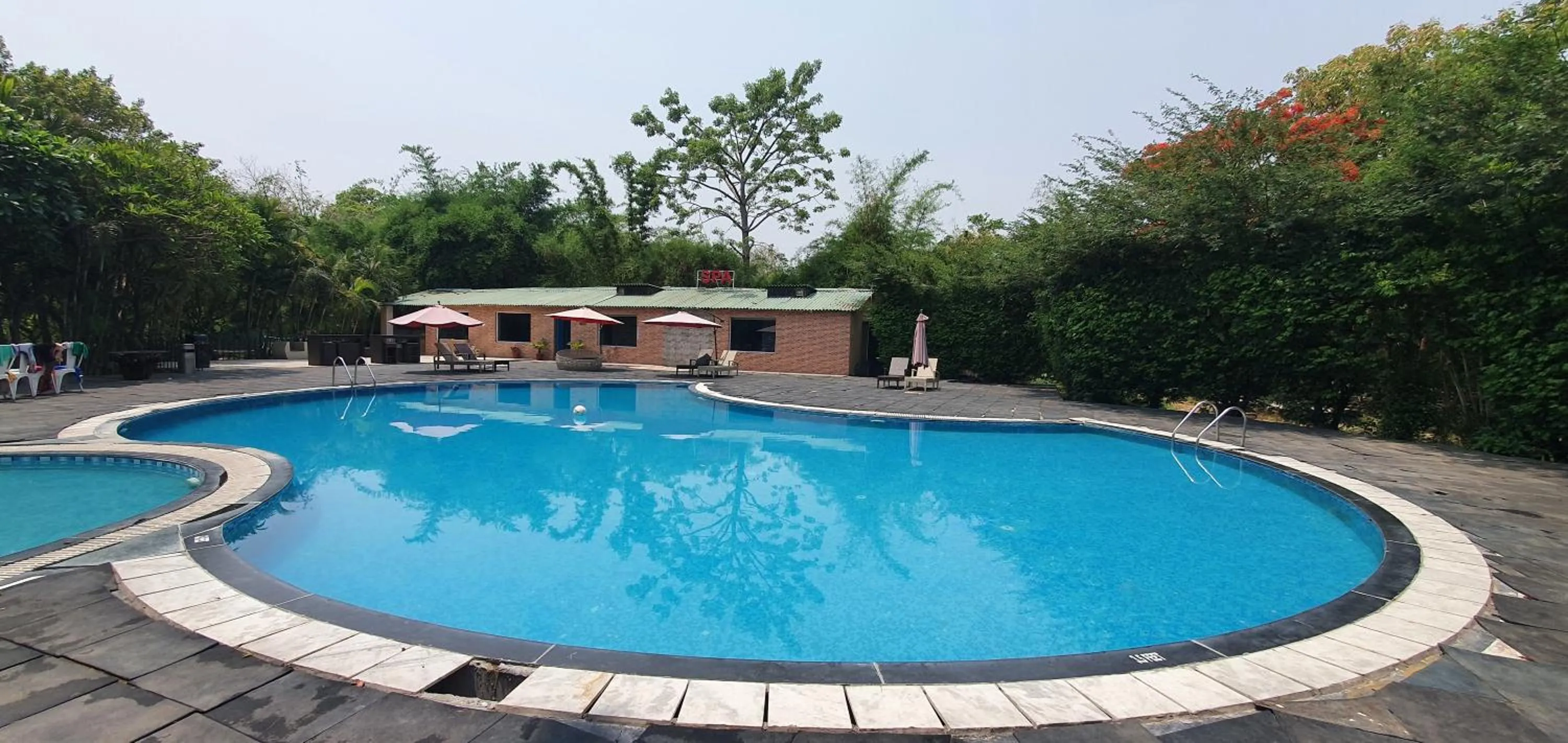 Swimming pool in Aacorn Hideaway Resort & Spa