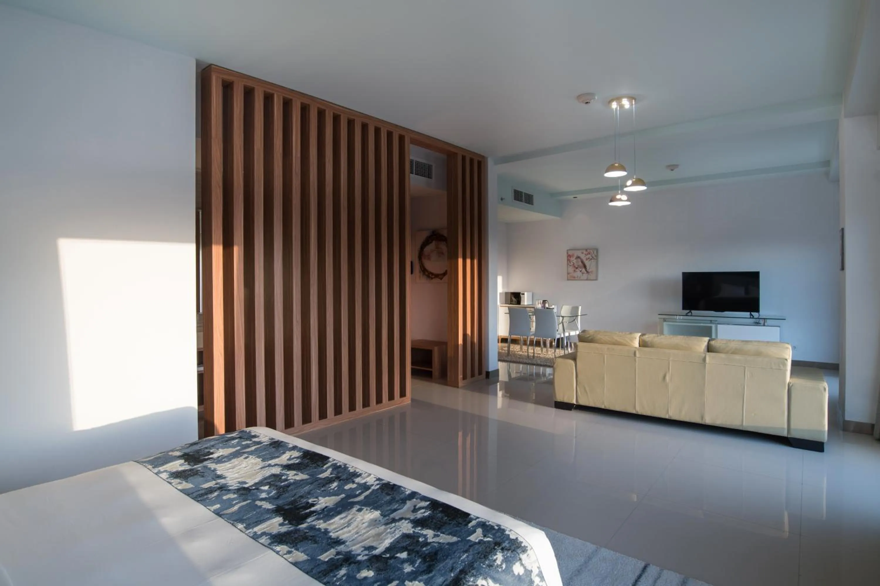 Living room, Bed in Holiday Inn Express Baruna by IHG