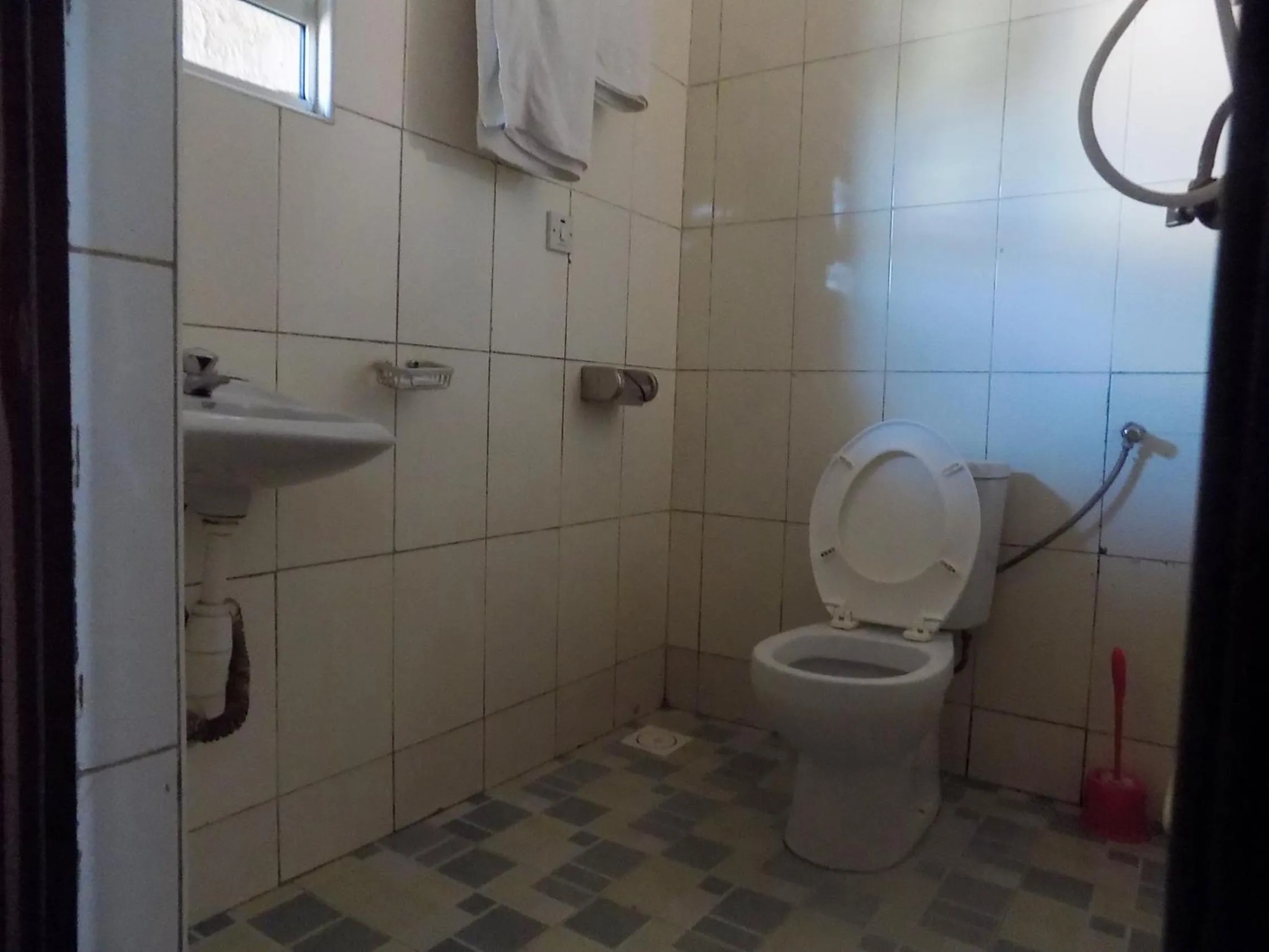 Toilet in G-One Hotel Kampala