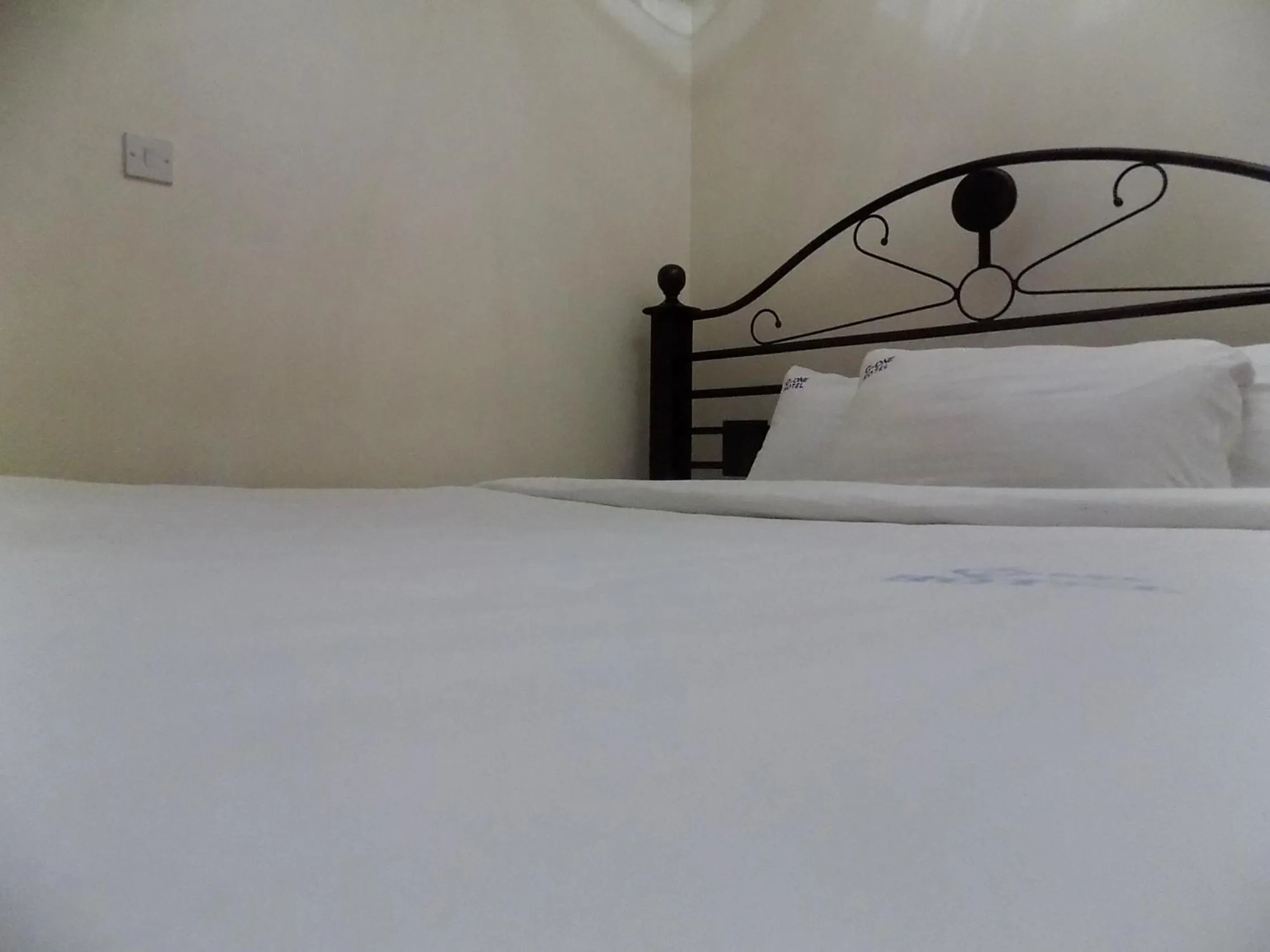 Bed in G-One Hotel Kampala