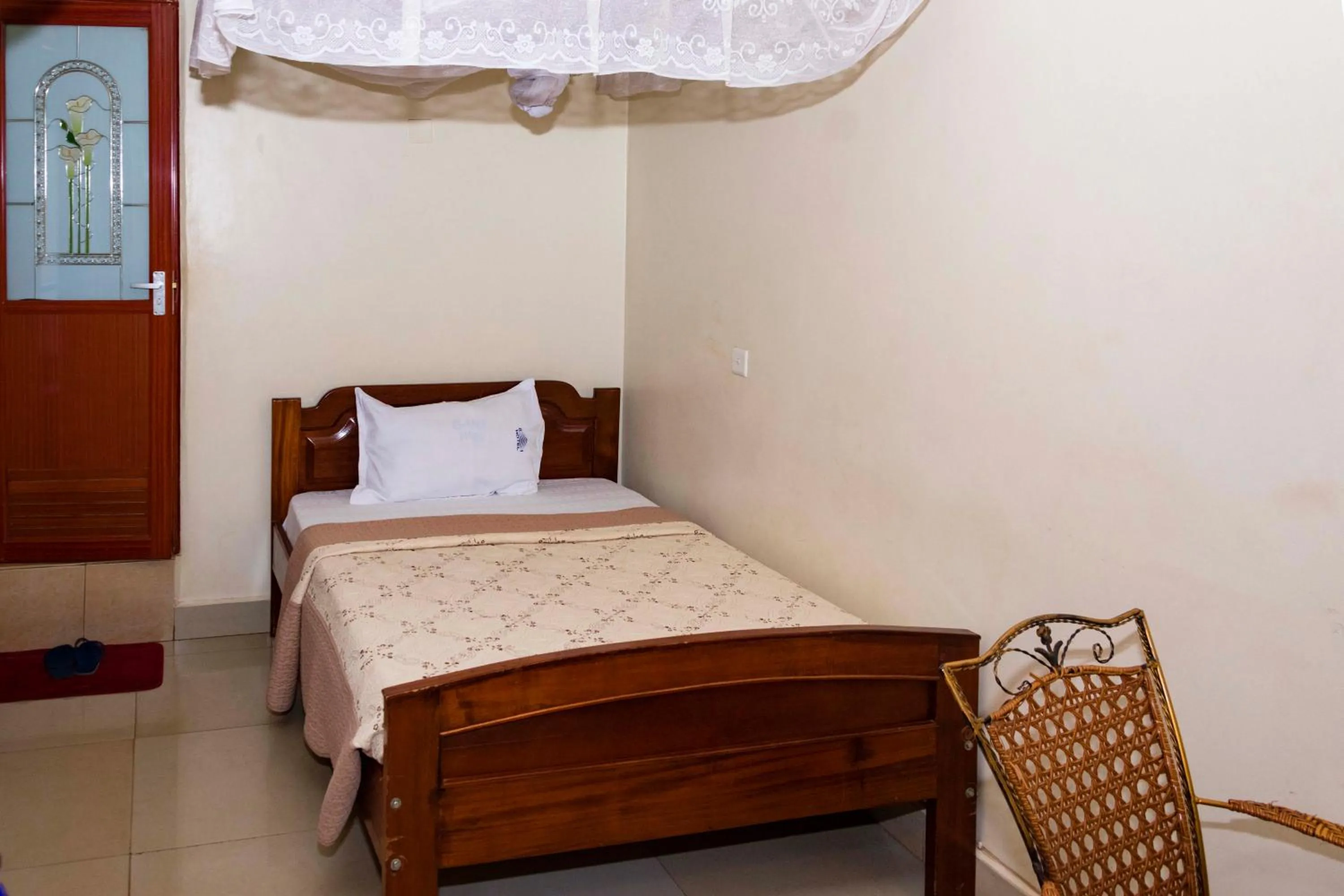 Bed in G-One Hotel Kampala