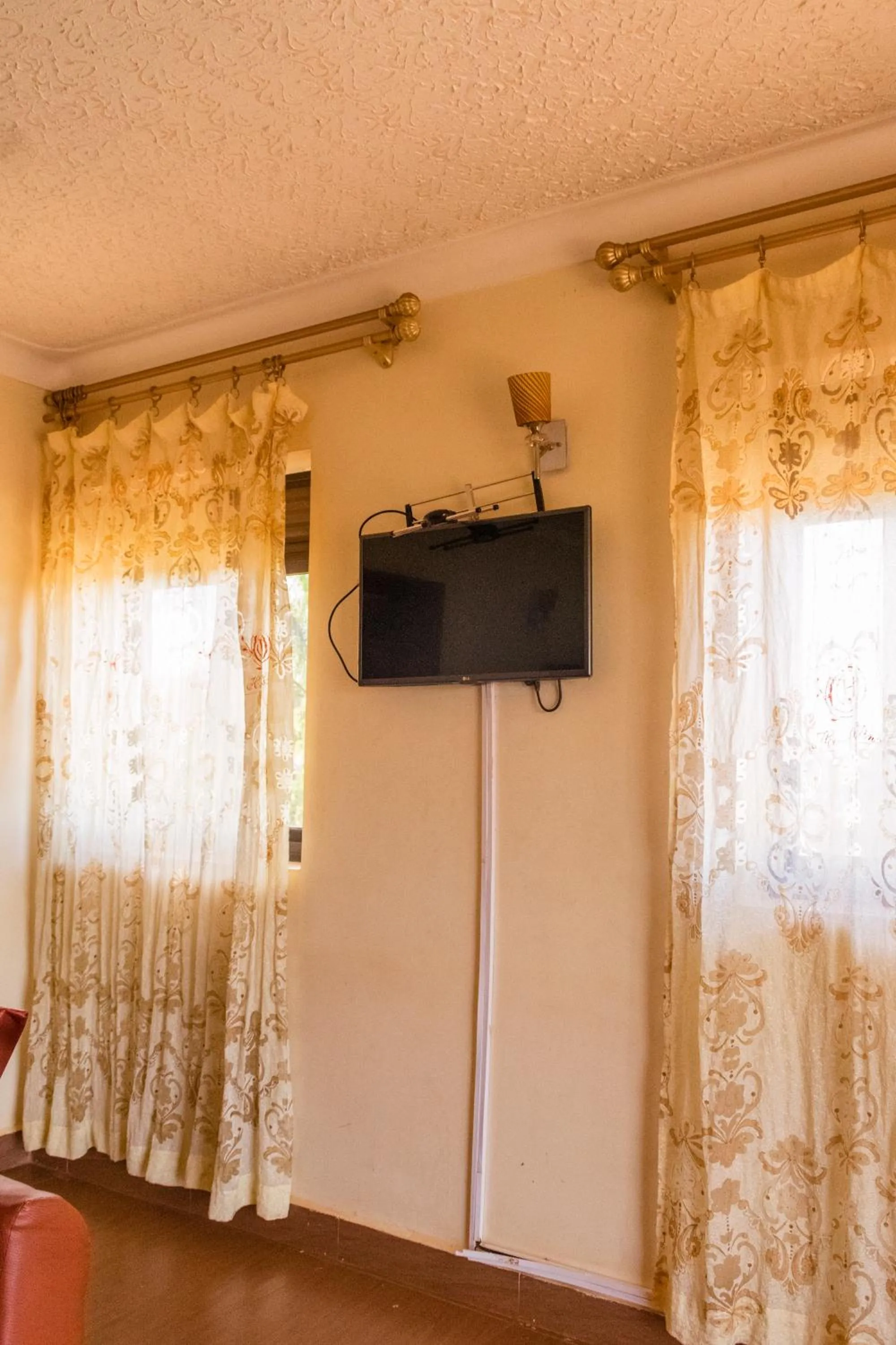 TV and multimedia in Olina Hotel and Apartments Kampala