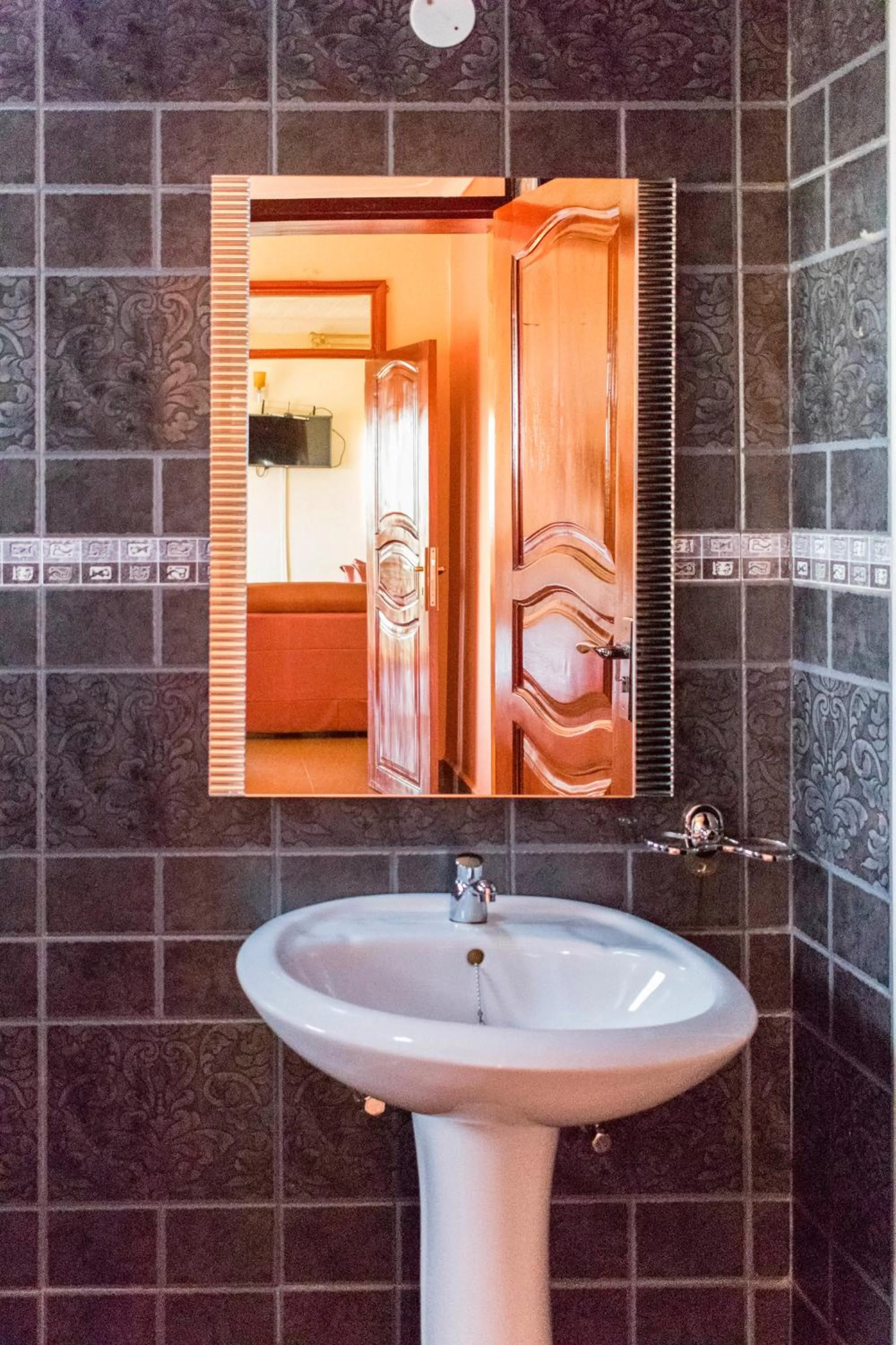 Bathroom in Olina Hotel and Apartments Kampala