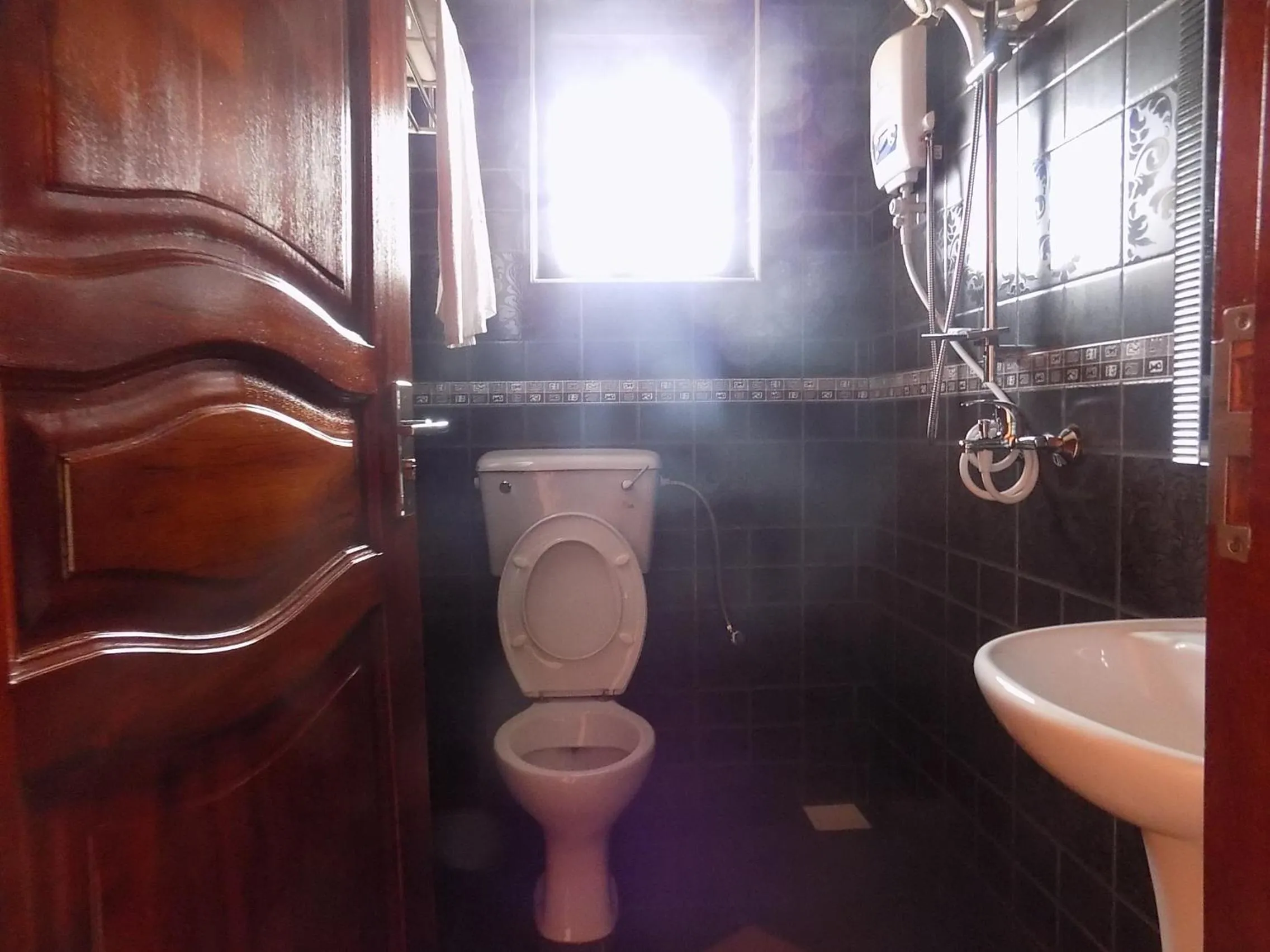 Bathroom in Olina Hotel and Apartments Kampala