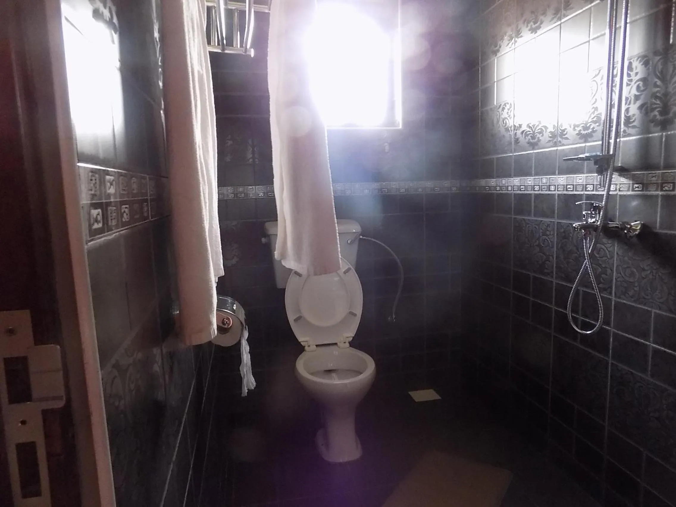 Bathroom in Olina Hotel and Apartments Kampala