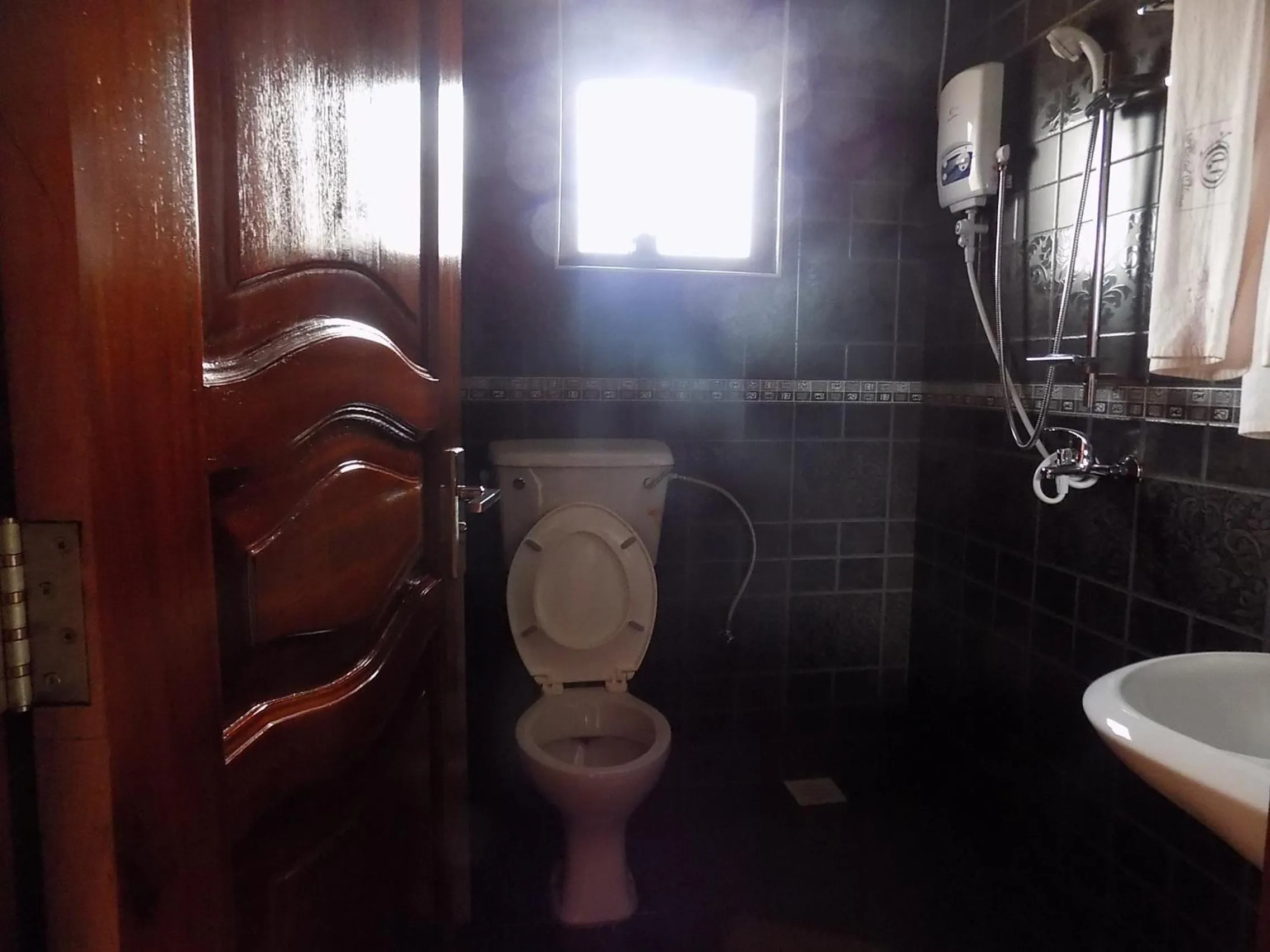 Bathroom in Olina Hotel and Apartments Kampala