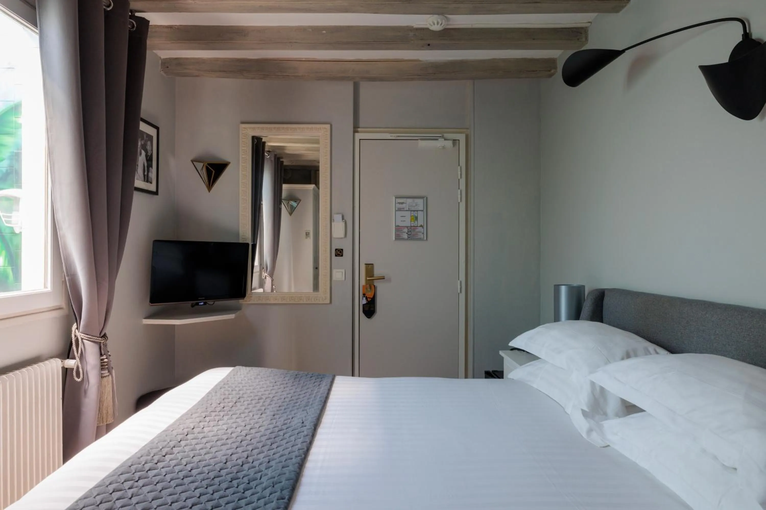 Bed in Hôtel Saint Martin Bastille