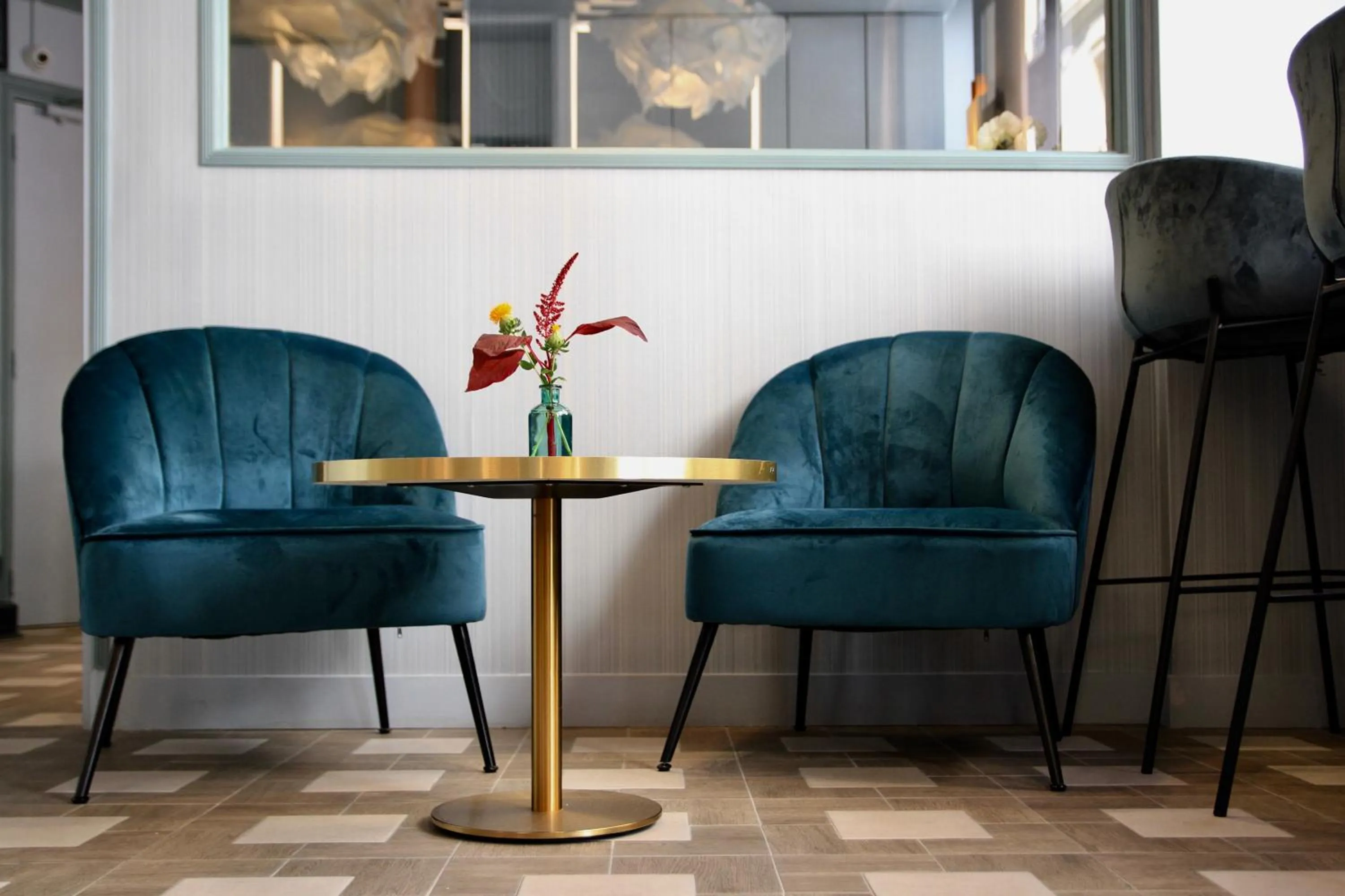 Communal lounge/ TV room in Amadeus Hotel