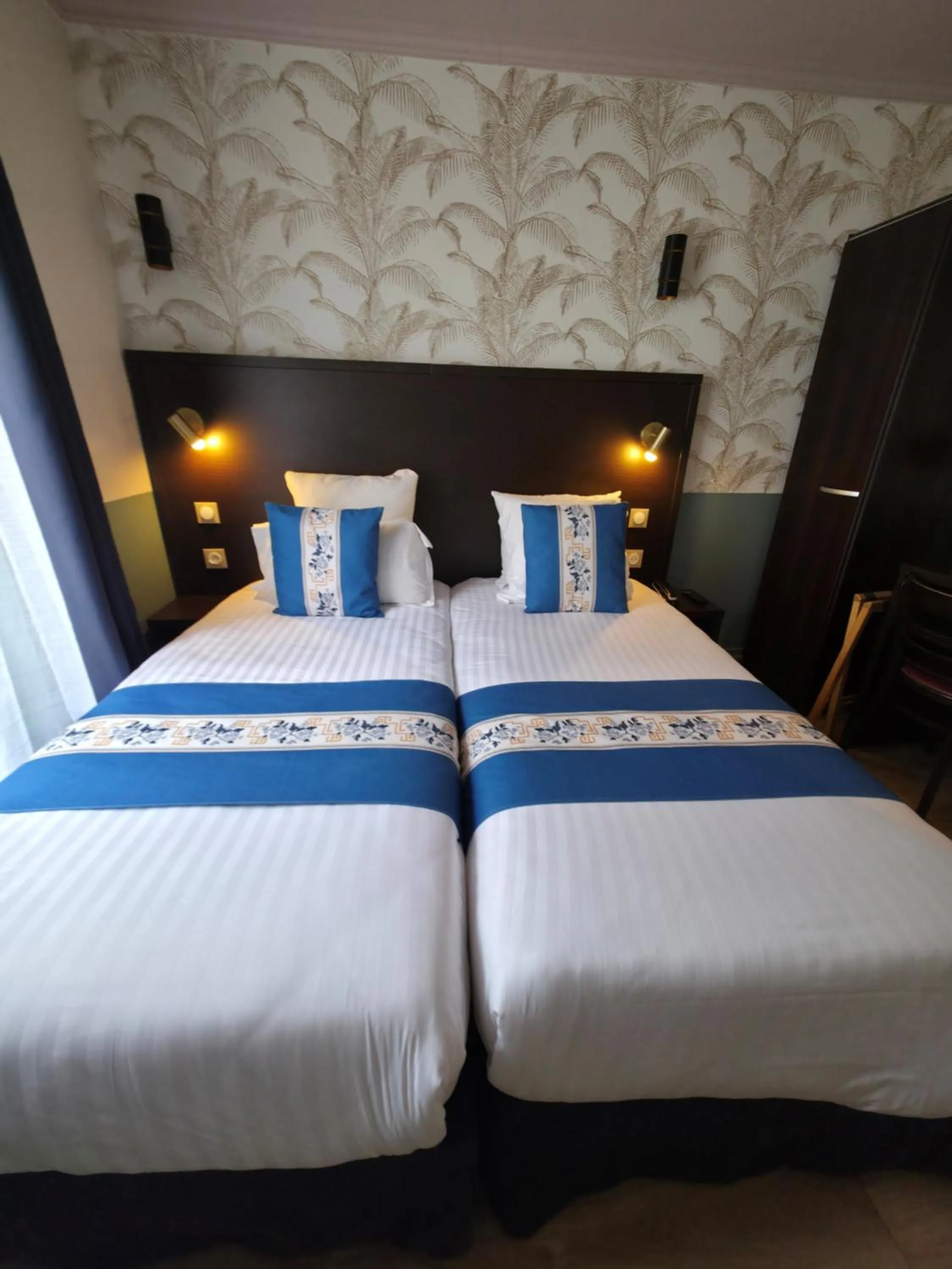 Bed in Amadeus Hotel