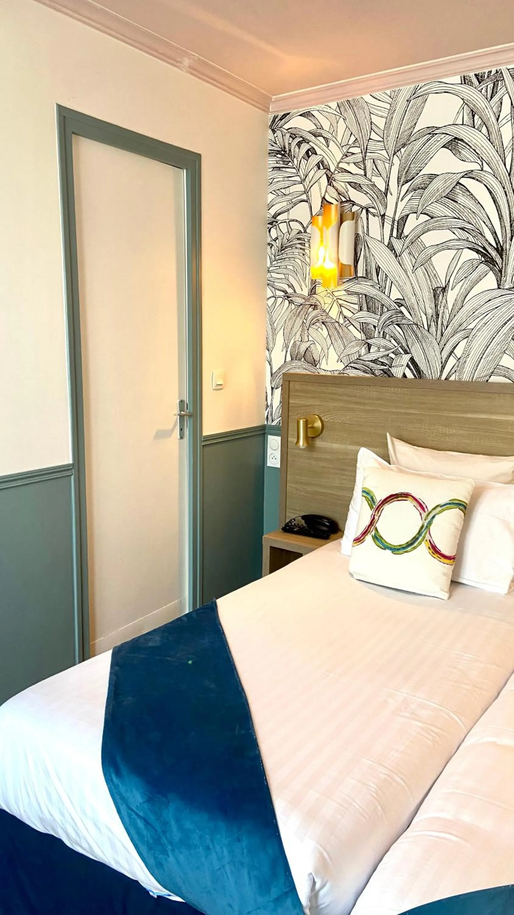 Bed in Amadeus Hotel