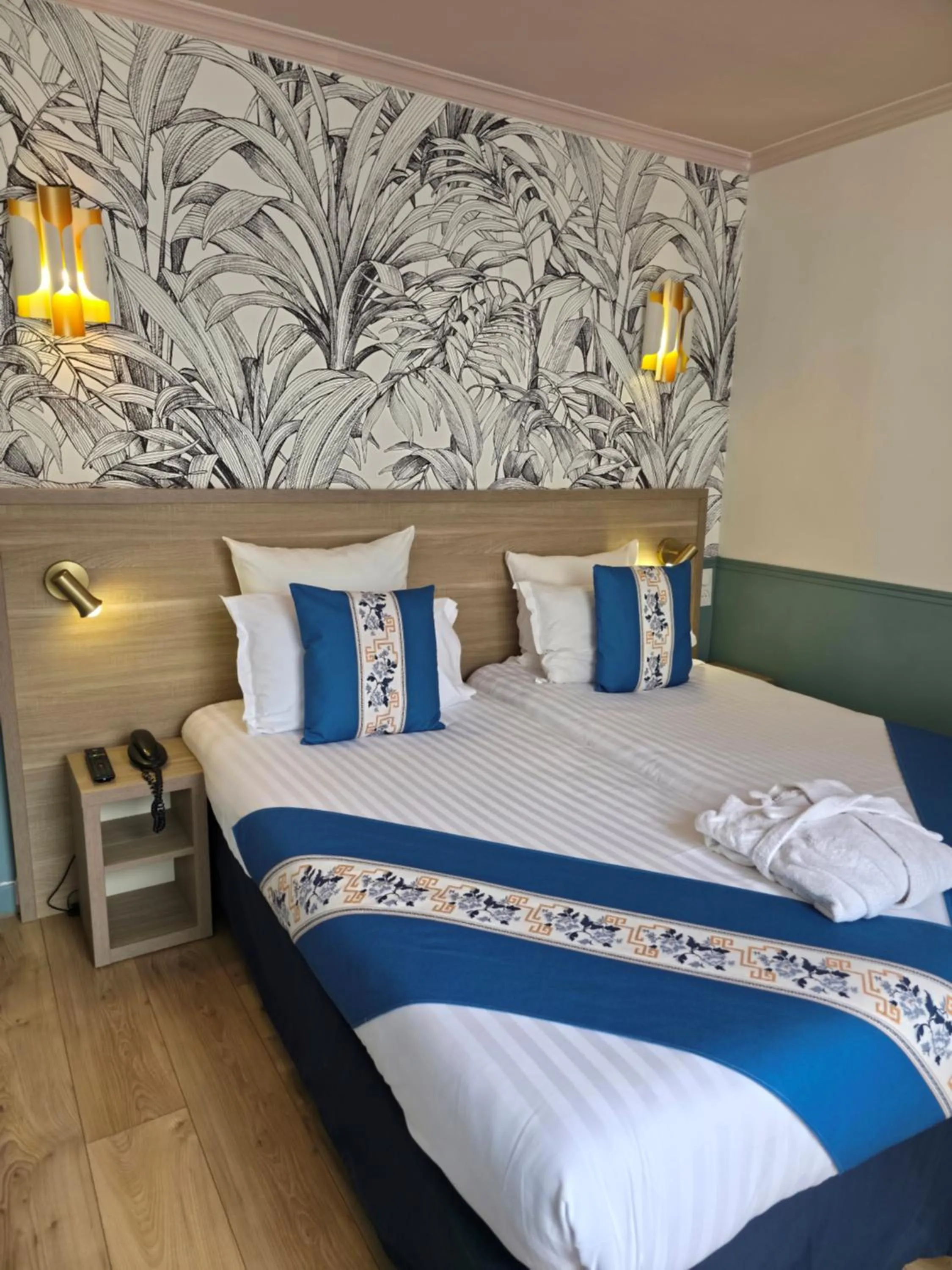 Bed in Amadeus Hotel