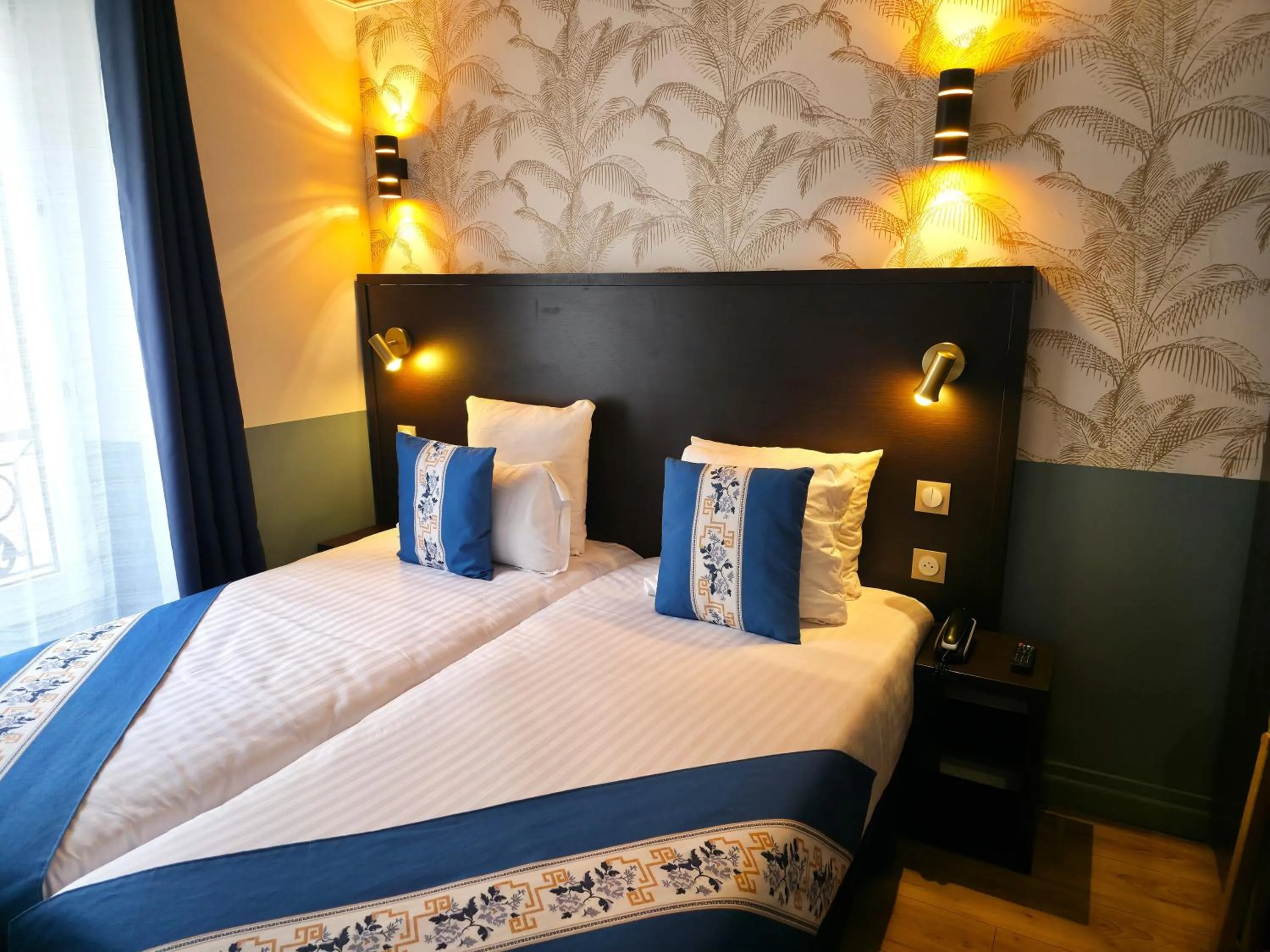 Bed in Amadeus Hotel