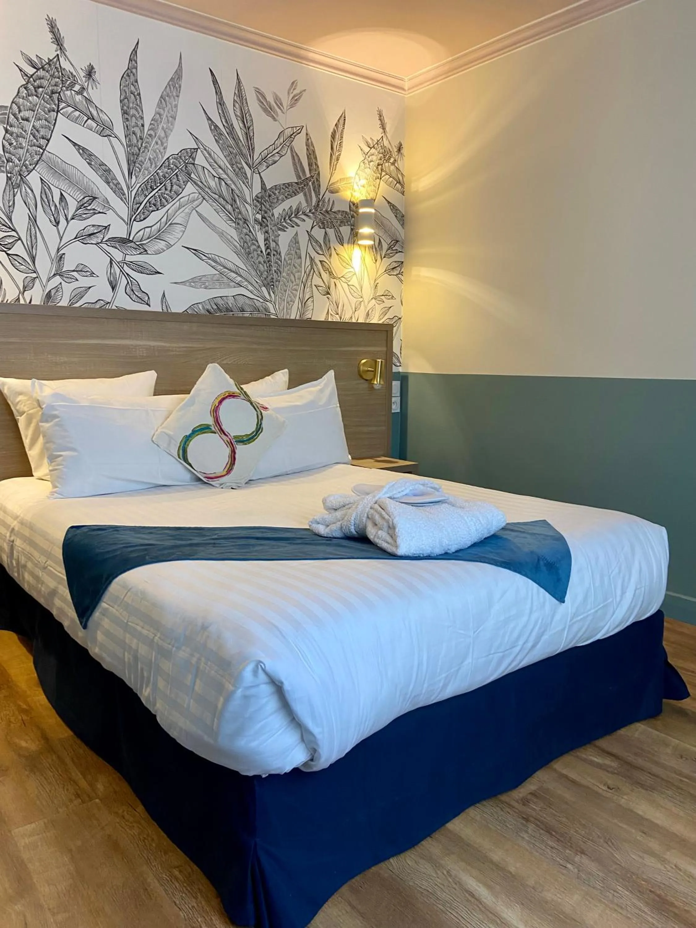 Bed in Amadeus Hotel