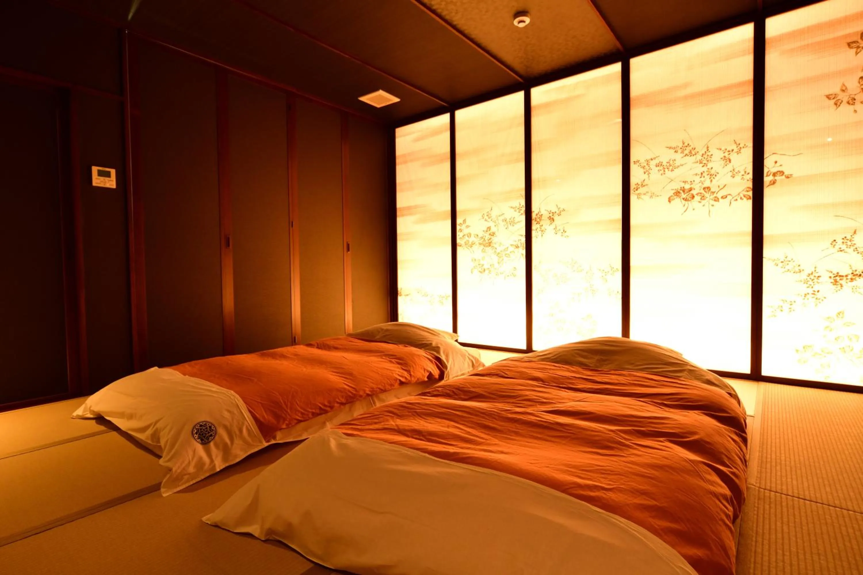 Bed in Balinese onsen ryokan Hakone Airu