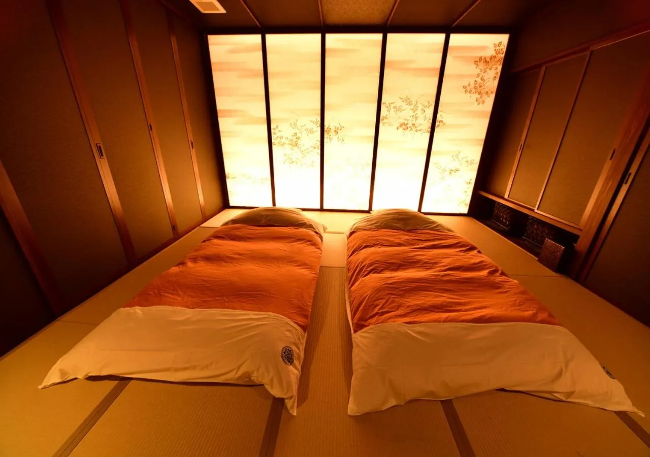 Bed in Balinese onsen ryokan Hakone Airu