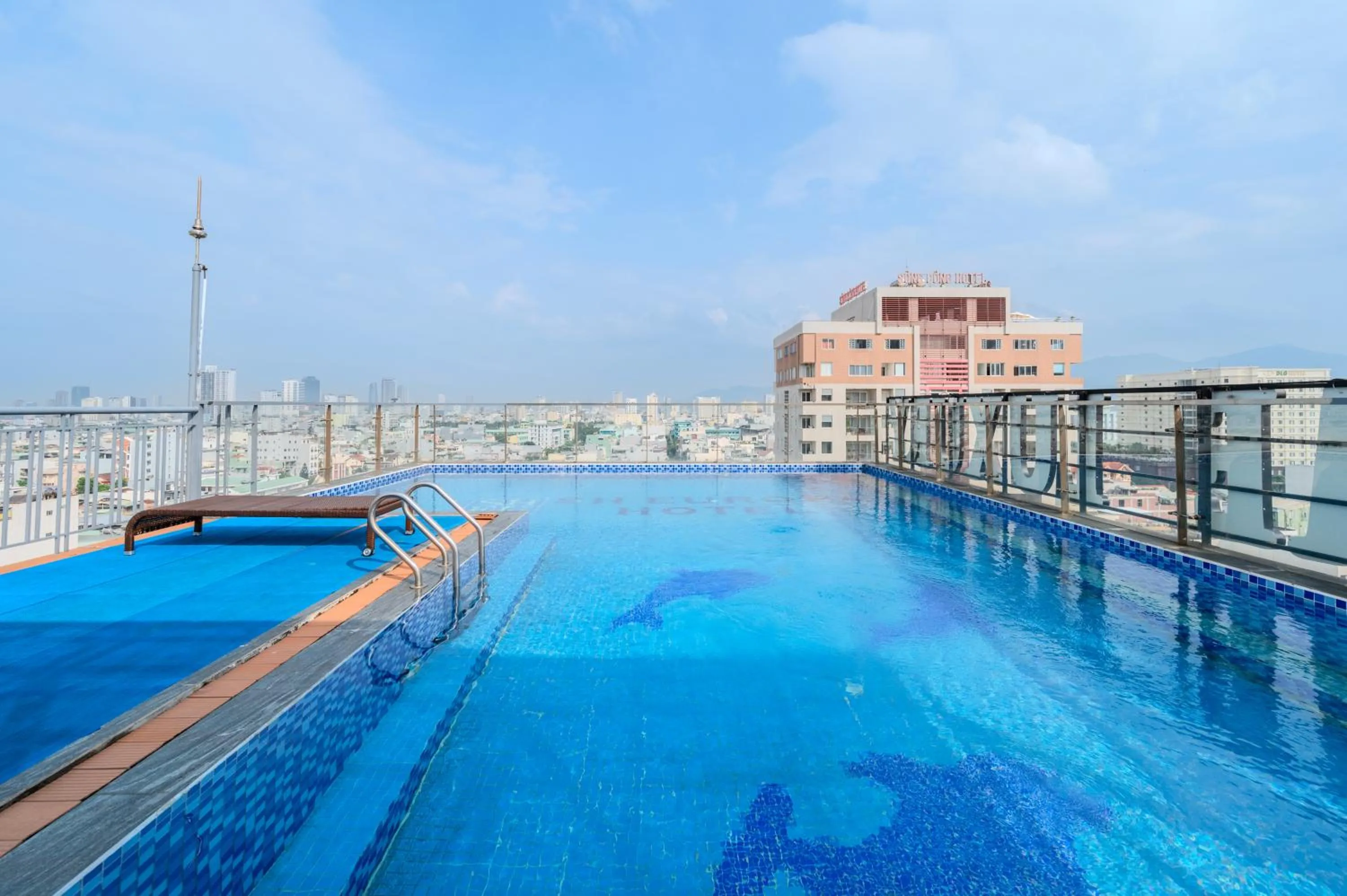Swimming pool in Maxhome Luxury Hotel