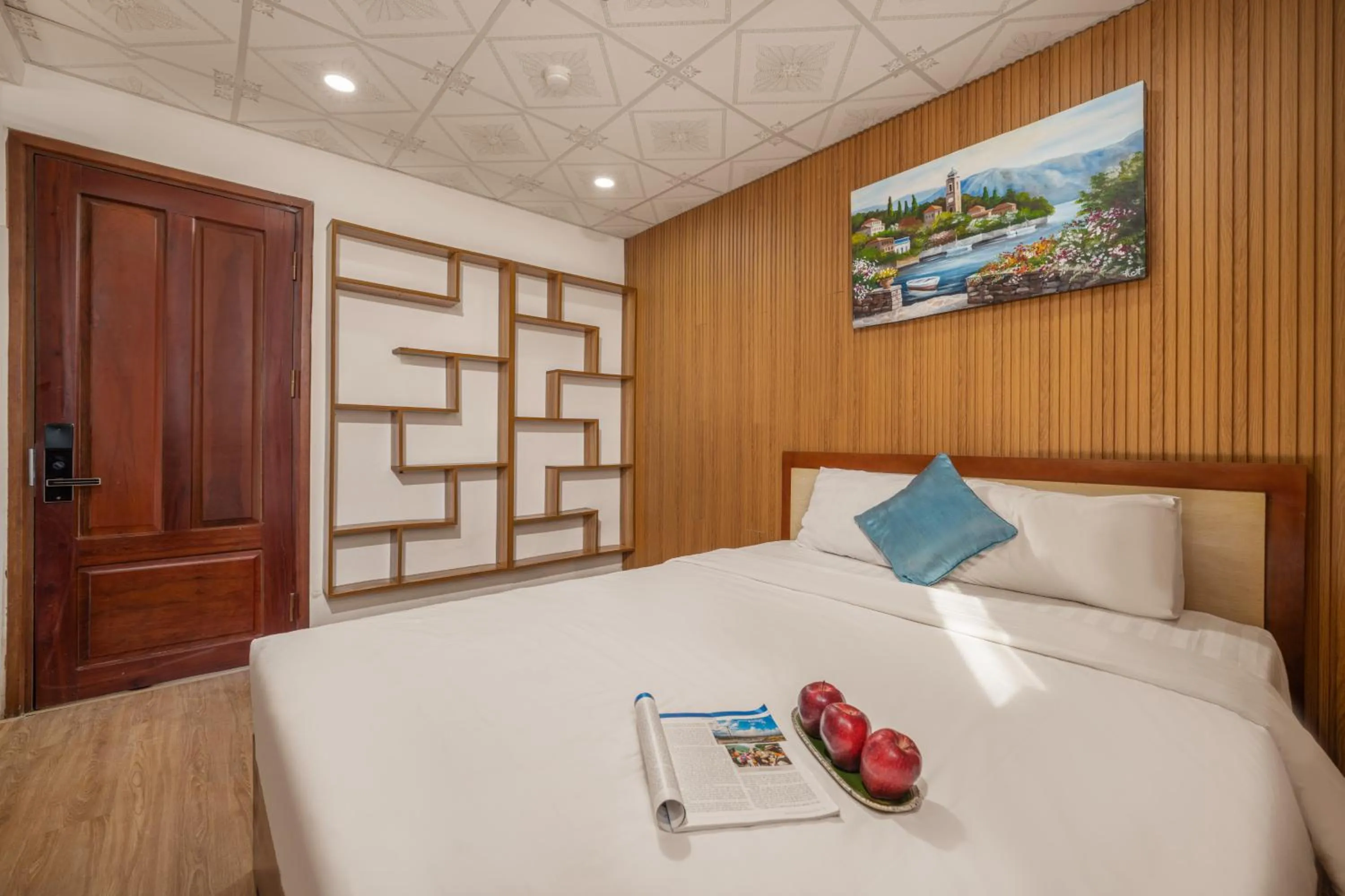 Bed in Maxhome Luxury Hotel