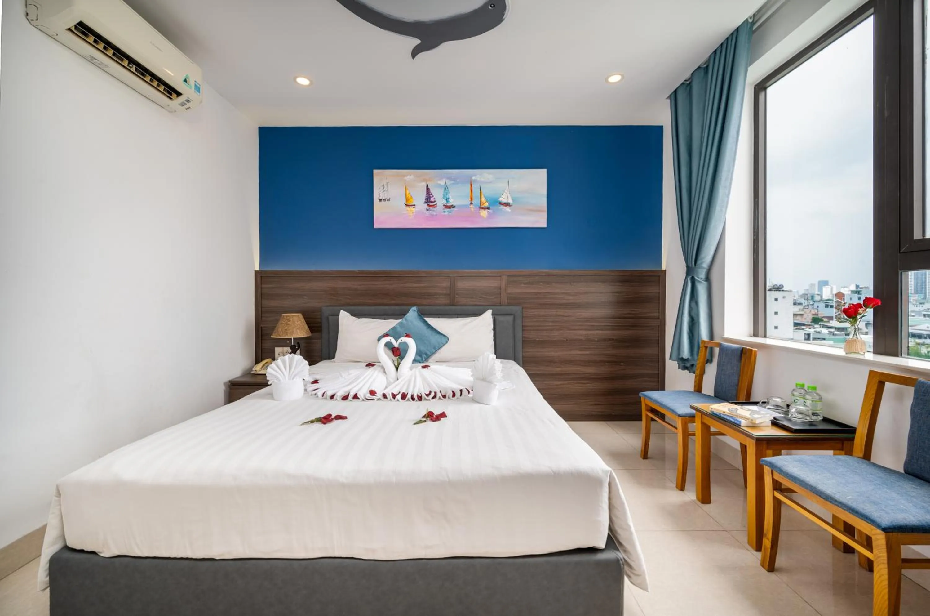 Bed in Maxhome Luxury Hotel