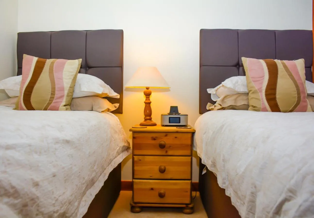 Bedroom, Bed in Clarke Cottage Guest House