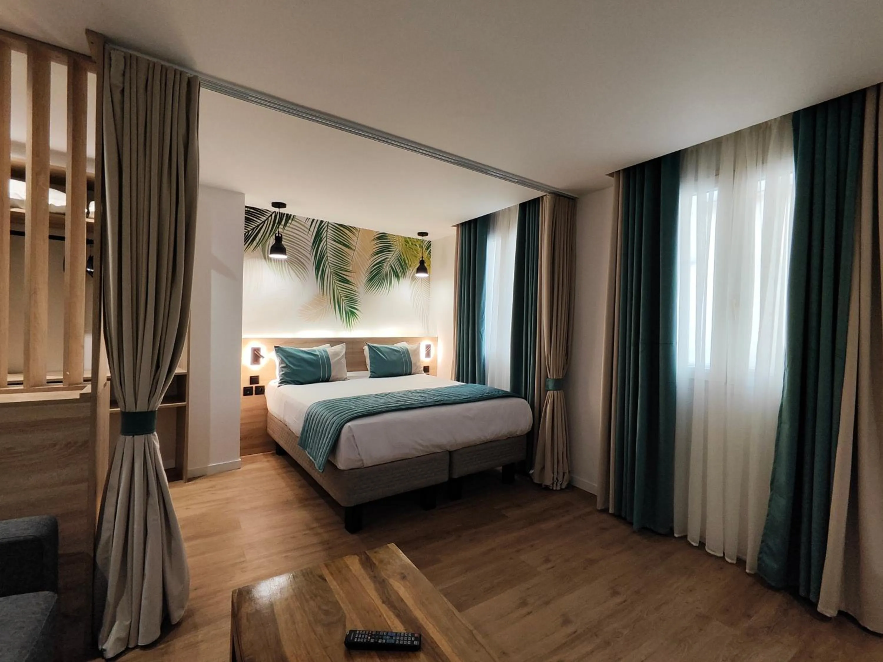 Bed in Atelier Montparnasse Hôtel