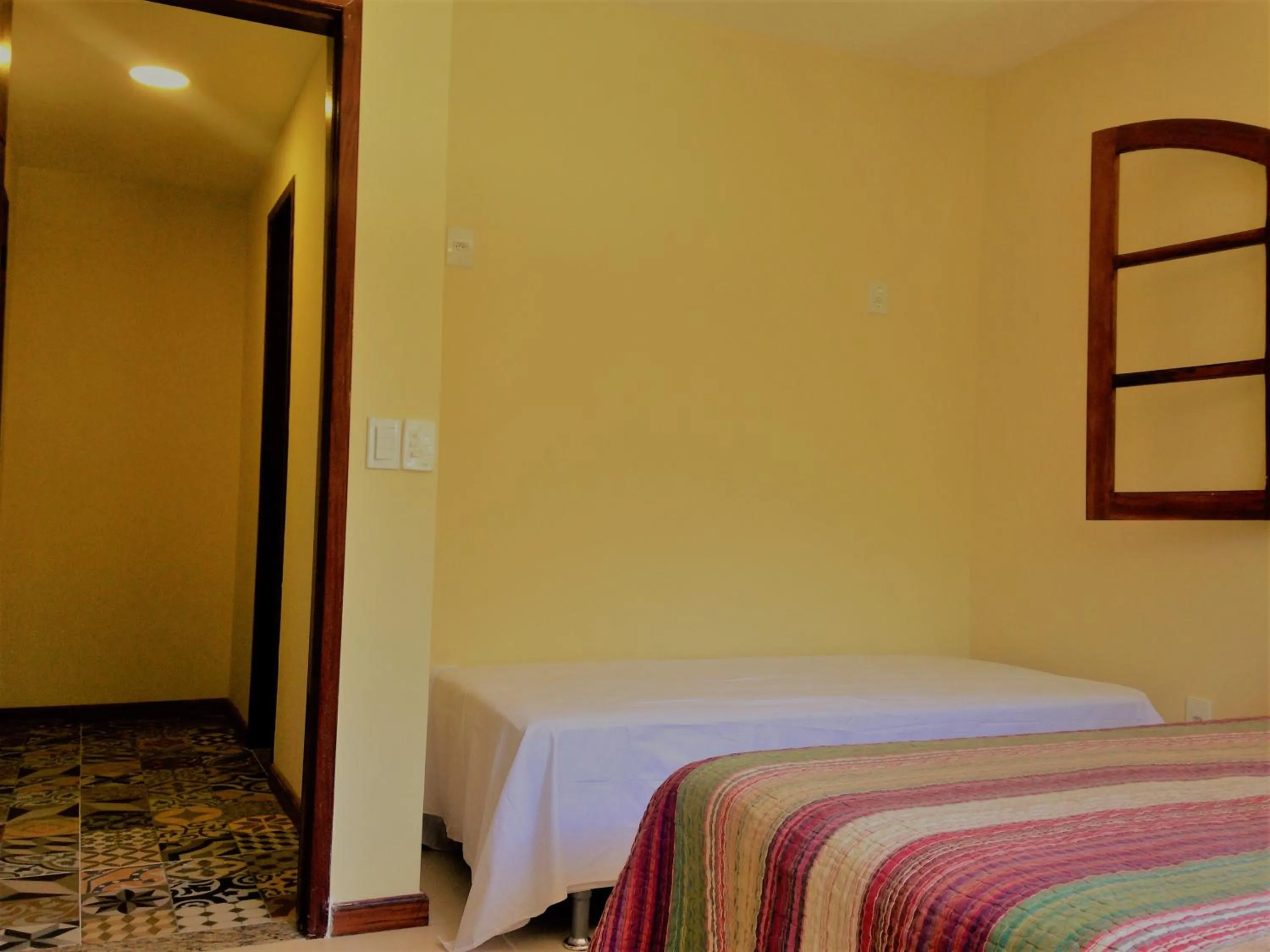 Photo of the whole room, Bed in Pousada Paraíso de Itaúna