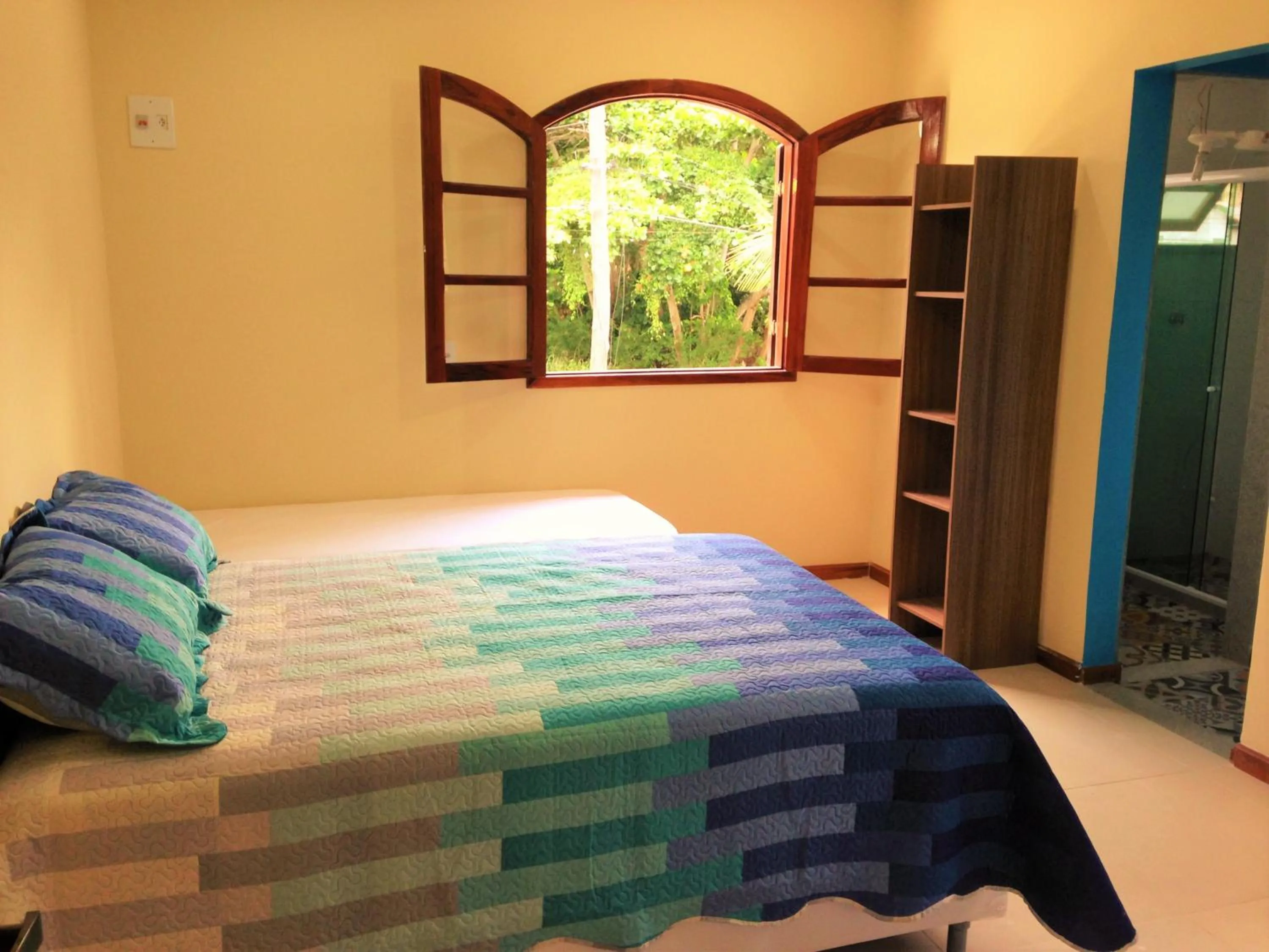 Photo of the whole room, Bed in Pousada Paraíso de Itaúna