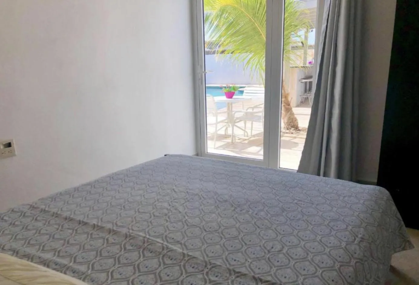 Bed in Genesis Apartments