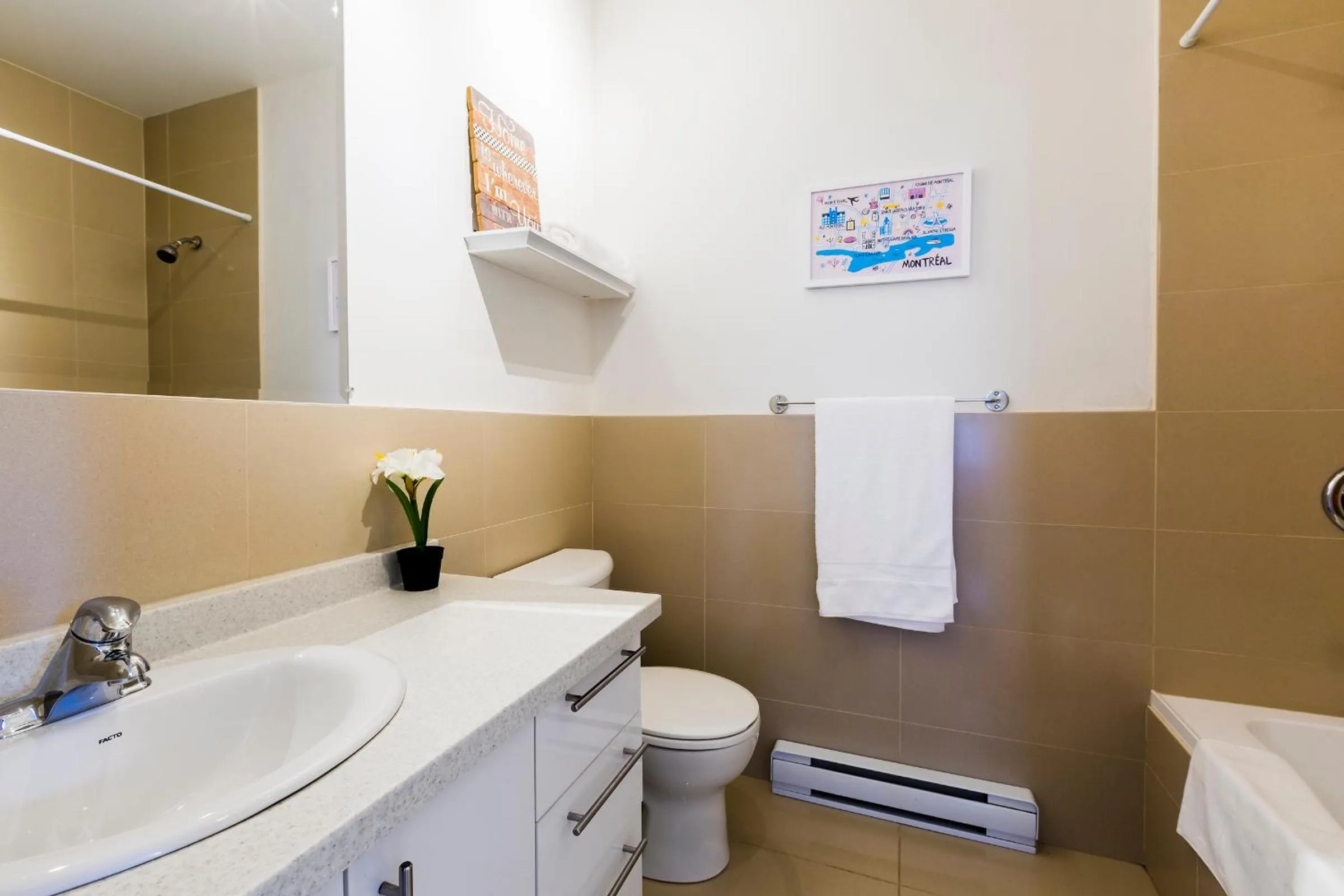 Toilet in MTLVacationRentals -The Chic Laurier