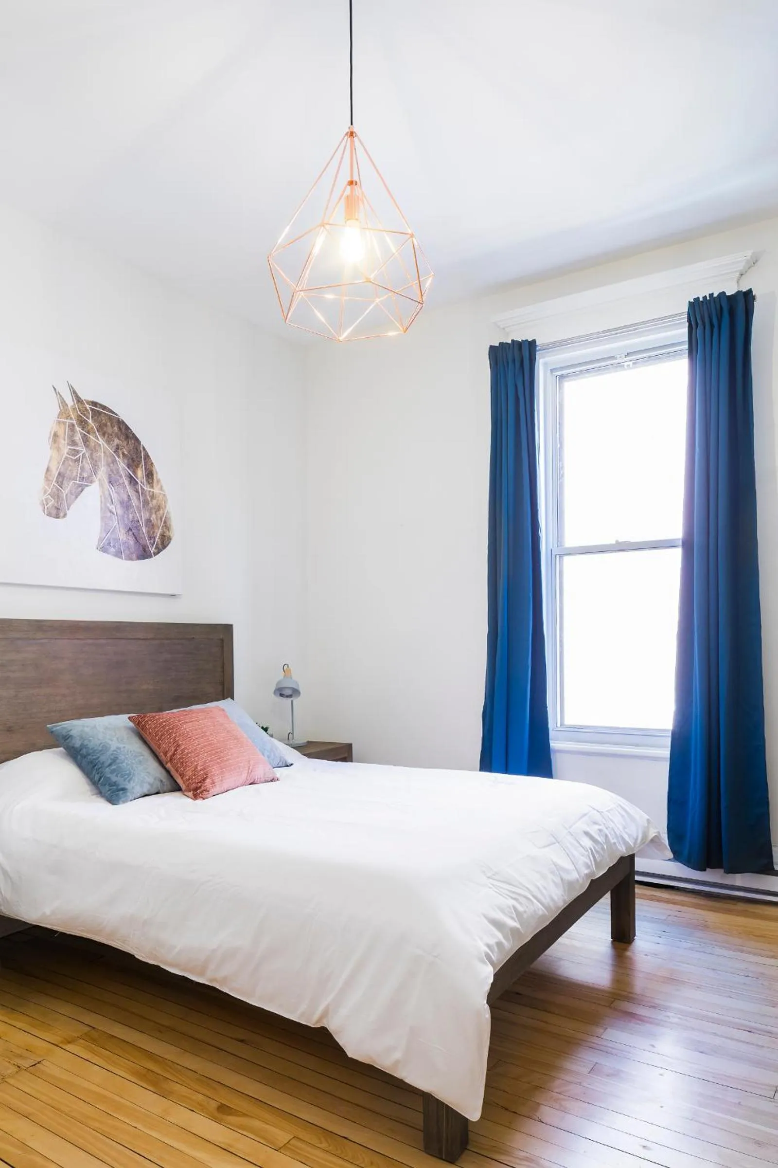 Bed in MTLVacationRentals -The Chic Laurier